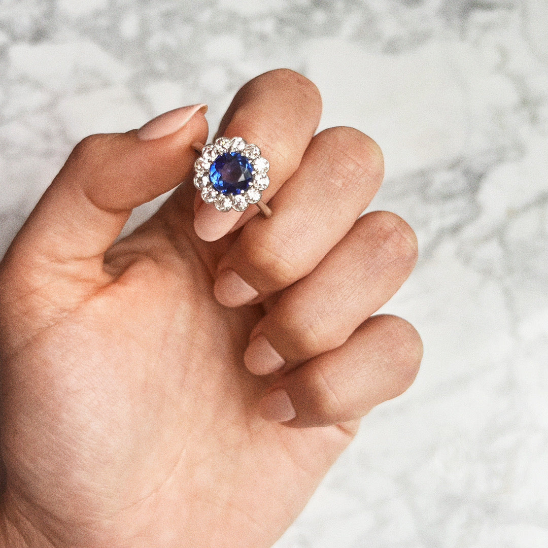 Platinum ring with a sapphire and diamonds