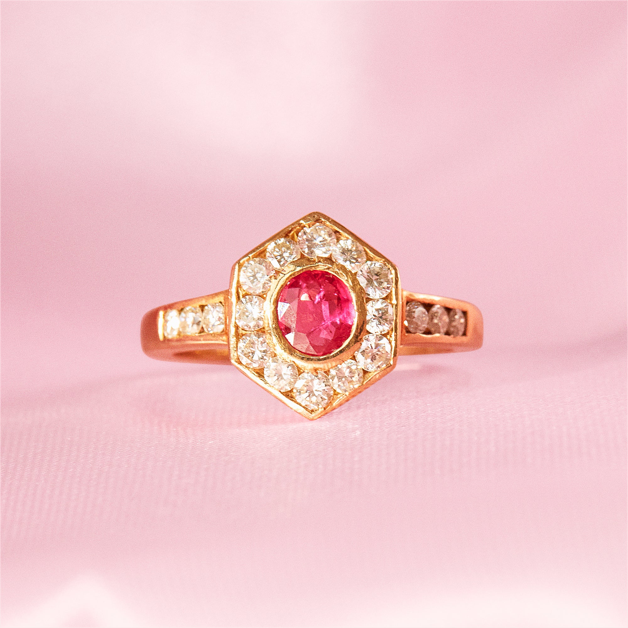 18ct gold ring set with a ruby and diamonds