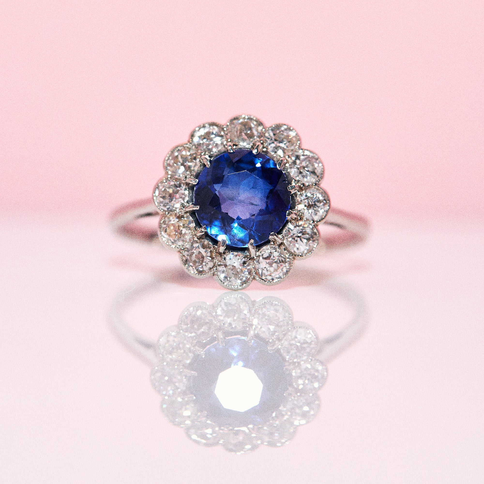Platinum ring with a sapphire and diamonds