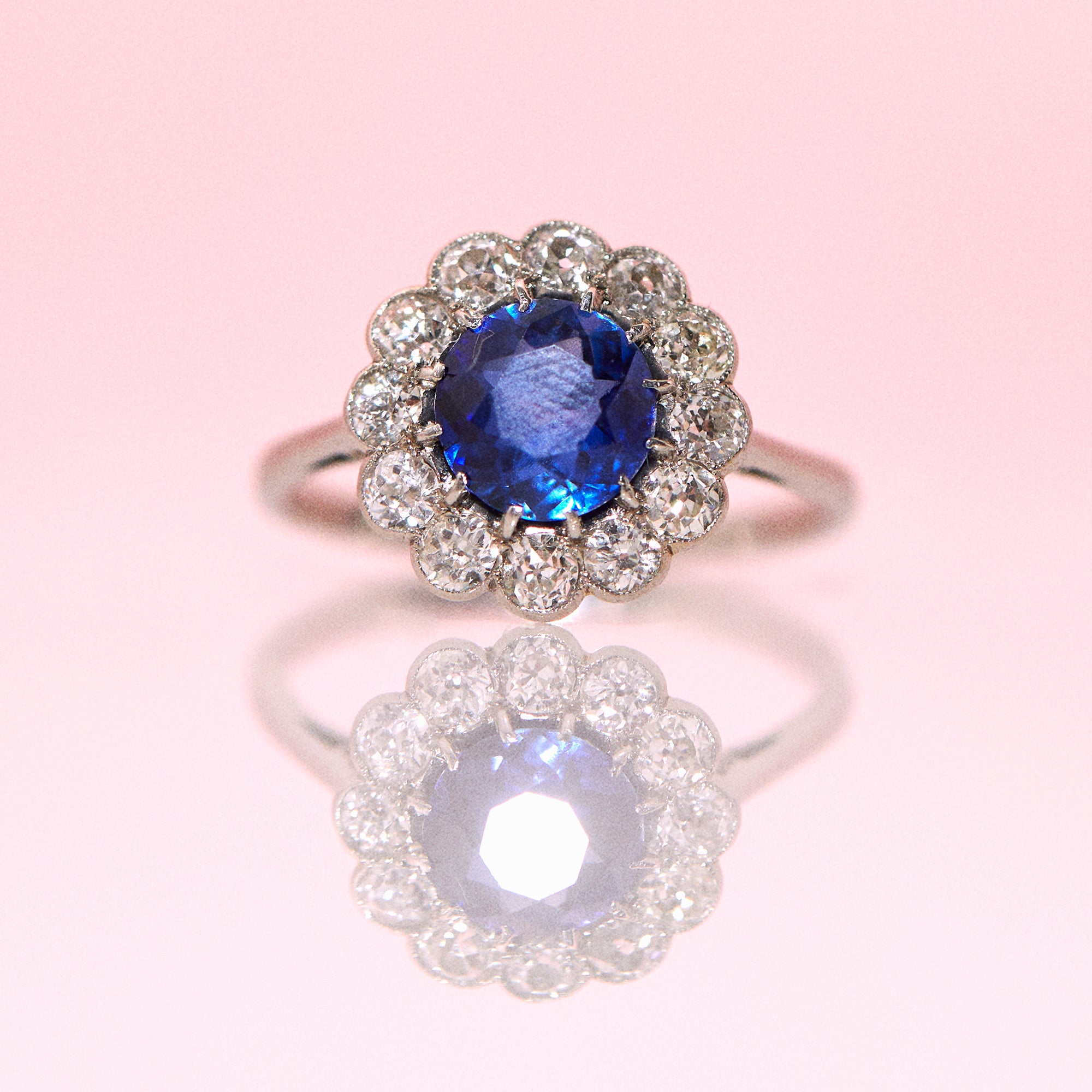 Platinum ring with a sapphire and diamonds
