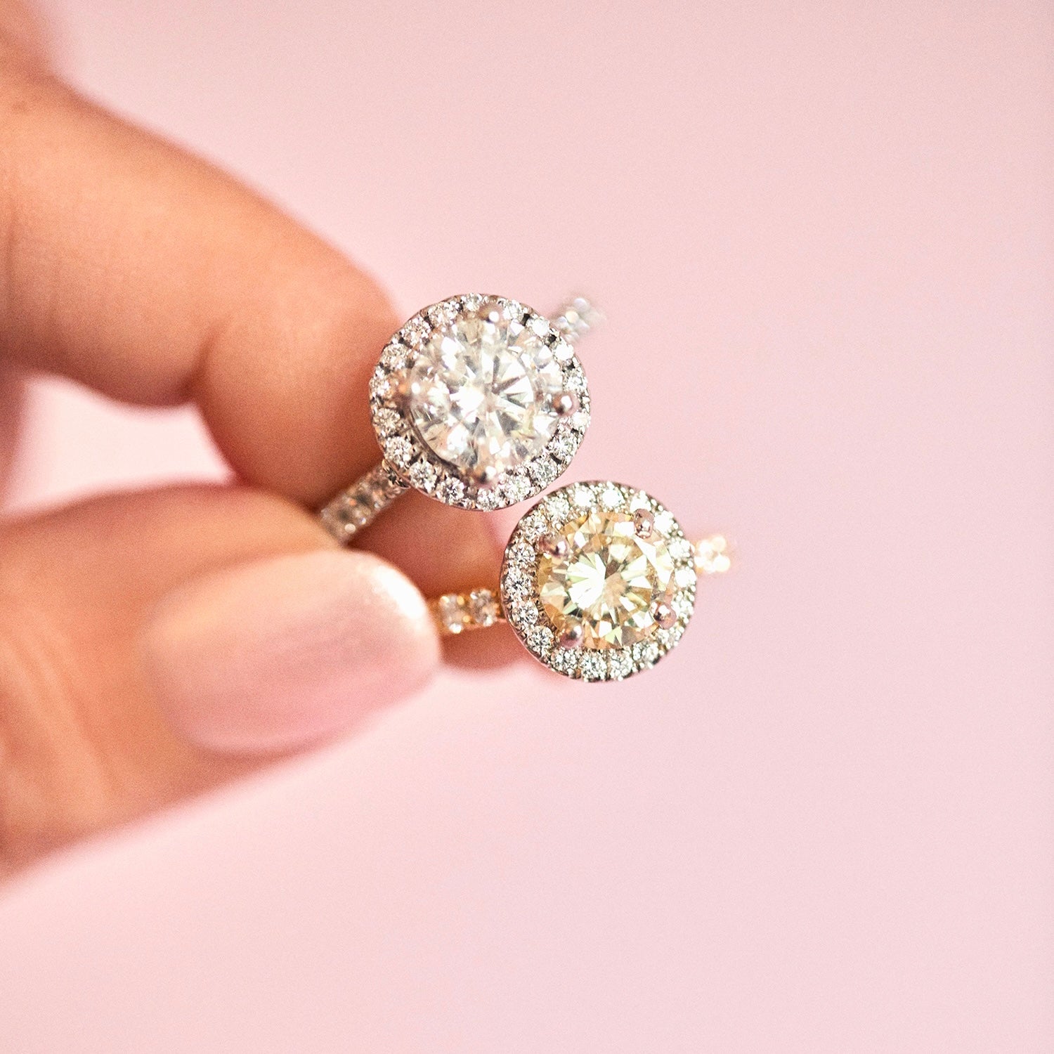 18ct yellow gold yellow diamond ring set with a diamond halo
