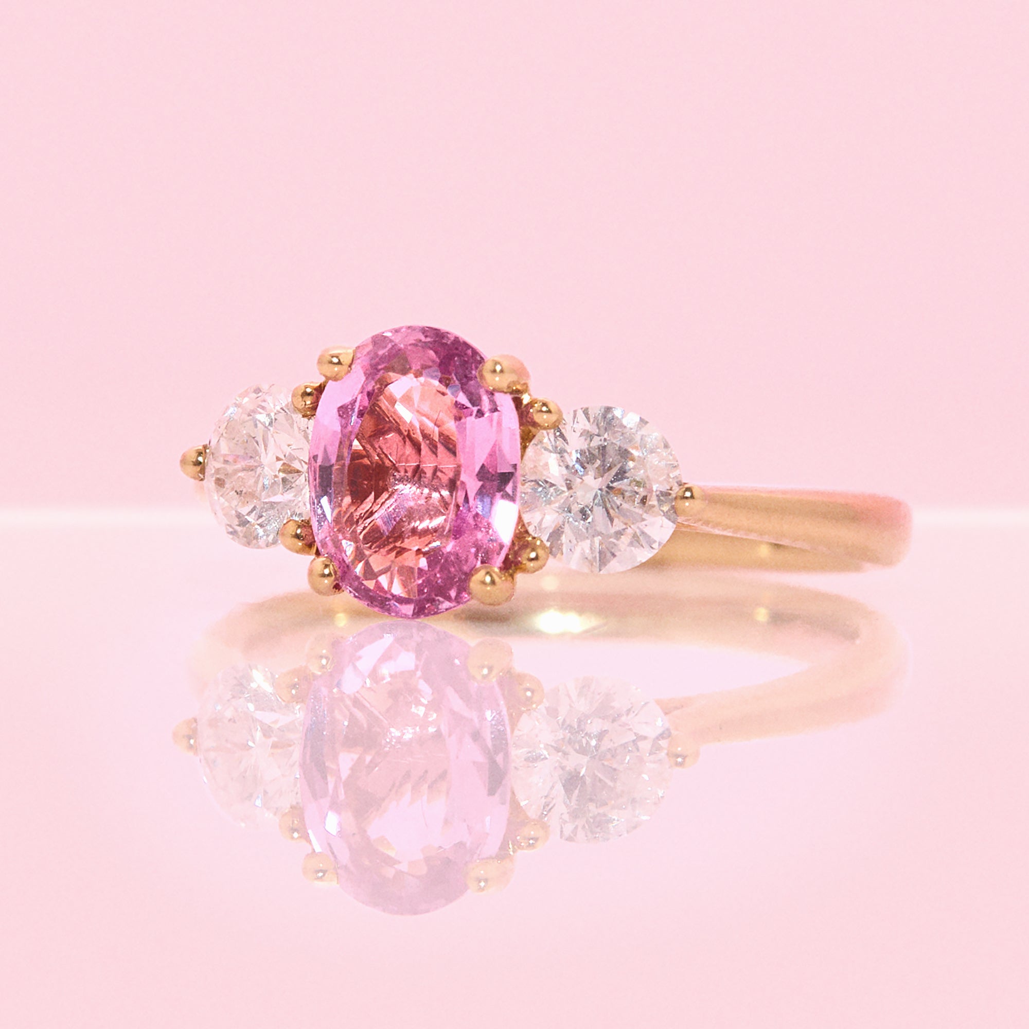 18ct gold 1.46ct pink sapphire and 0.84ct diamond three stone ring (made to order)