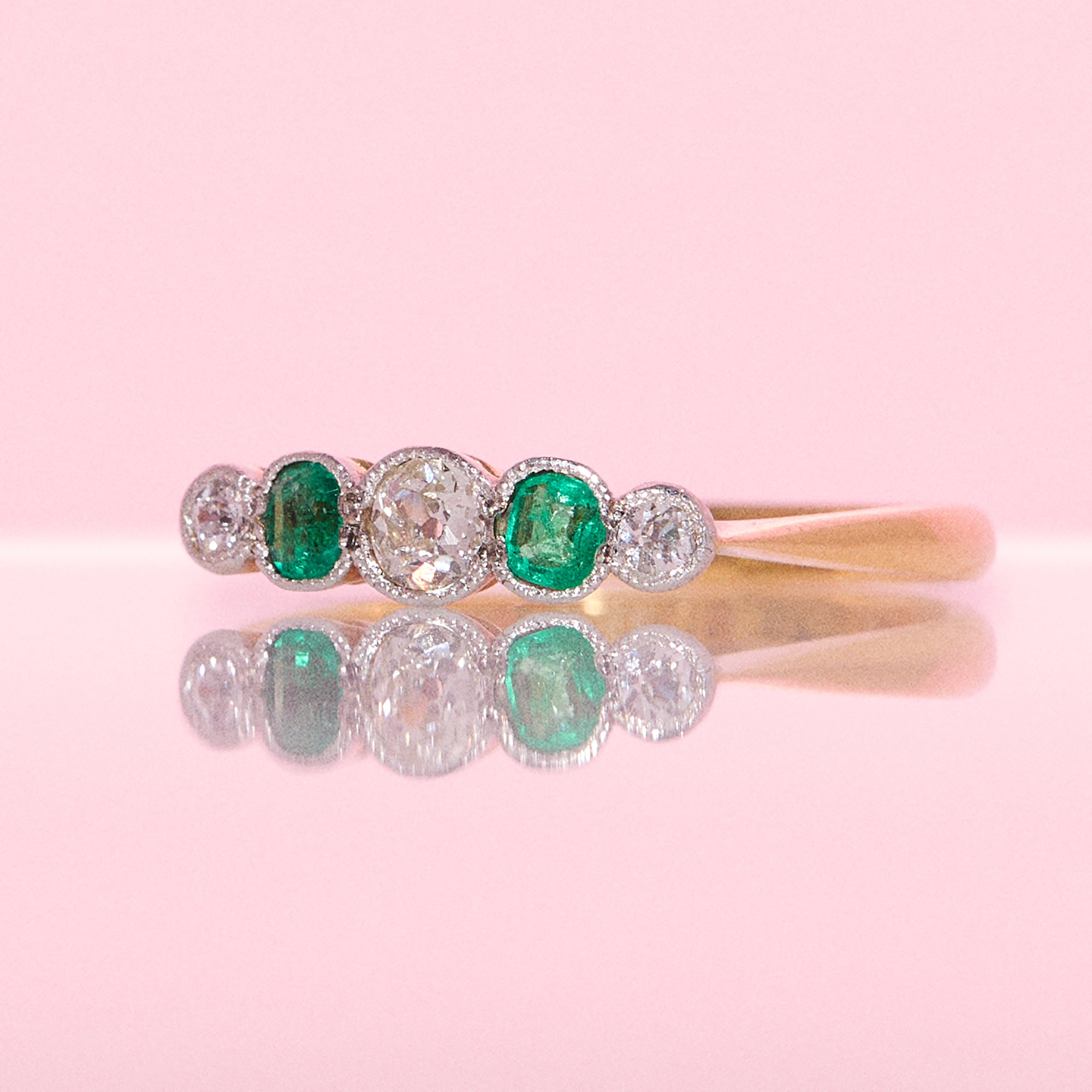18ct gold Colombian emerald and old cut diamond half eternity ring