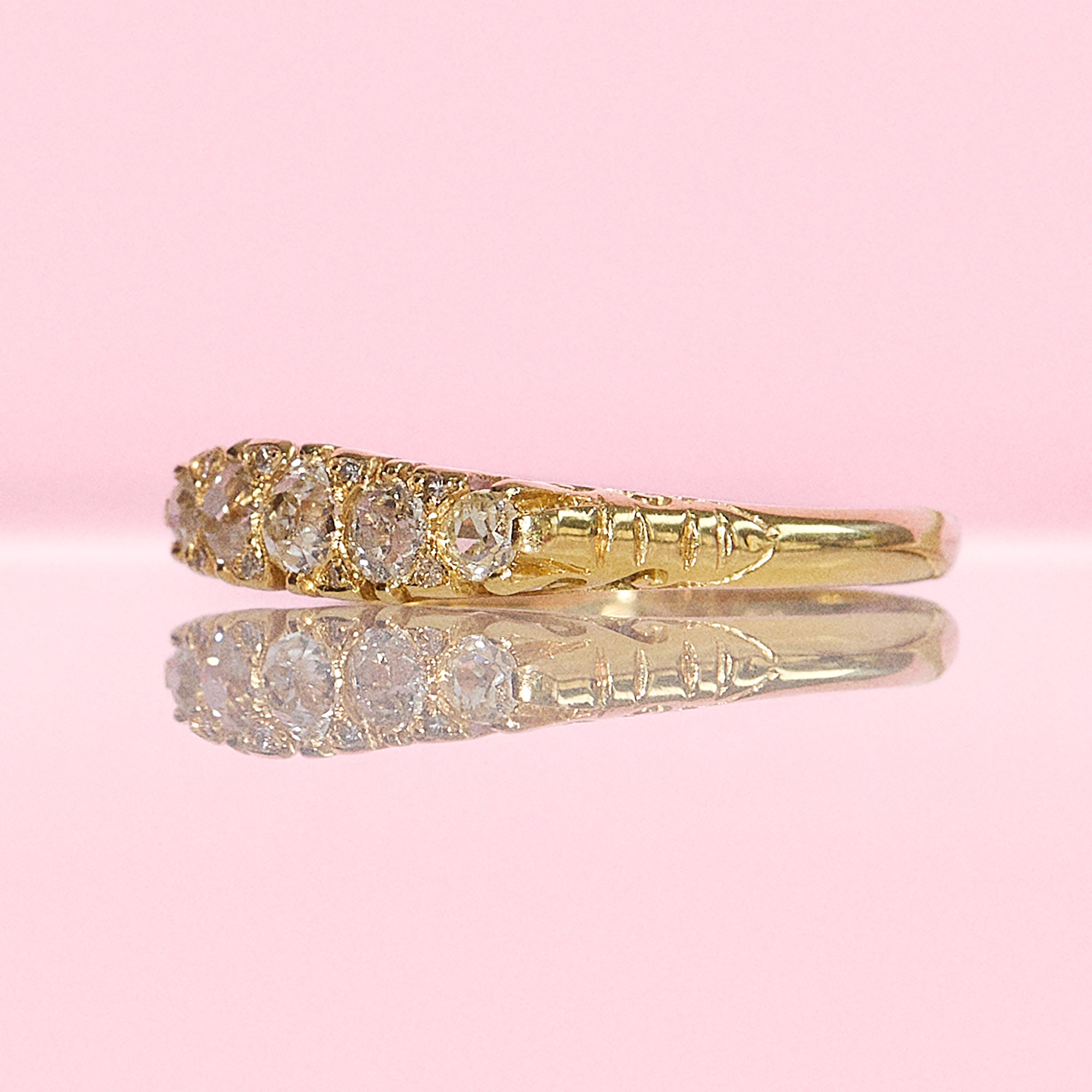 18ct gold old cut diamond five stone carved ring