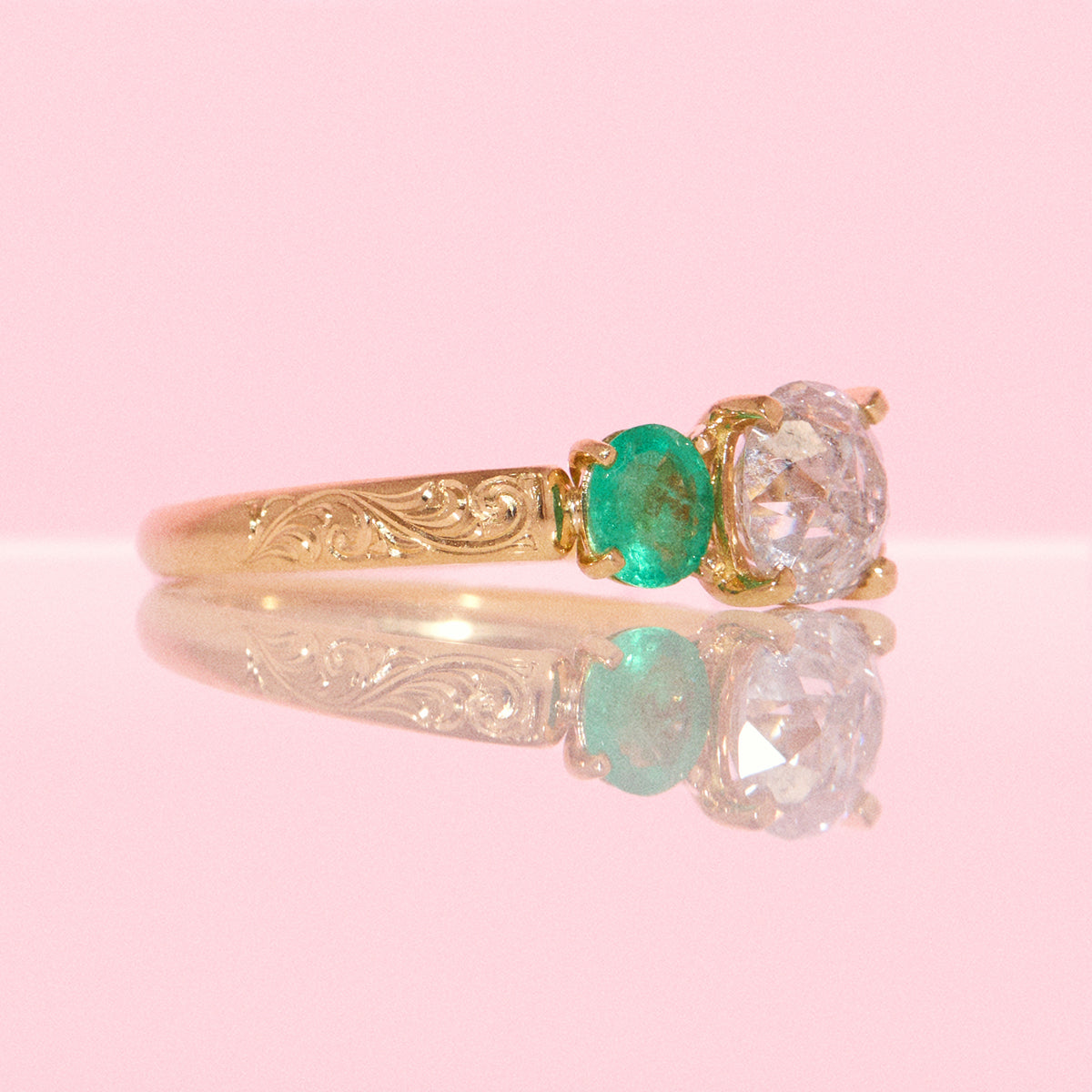 18ct yellow gold 1.569ct old cut vintage diamond, emerald and pink sapphire ‘Two Become One’ engraved ring