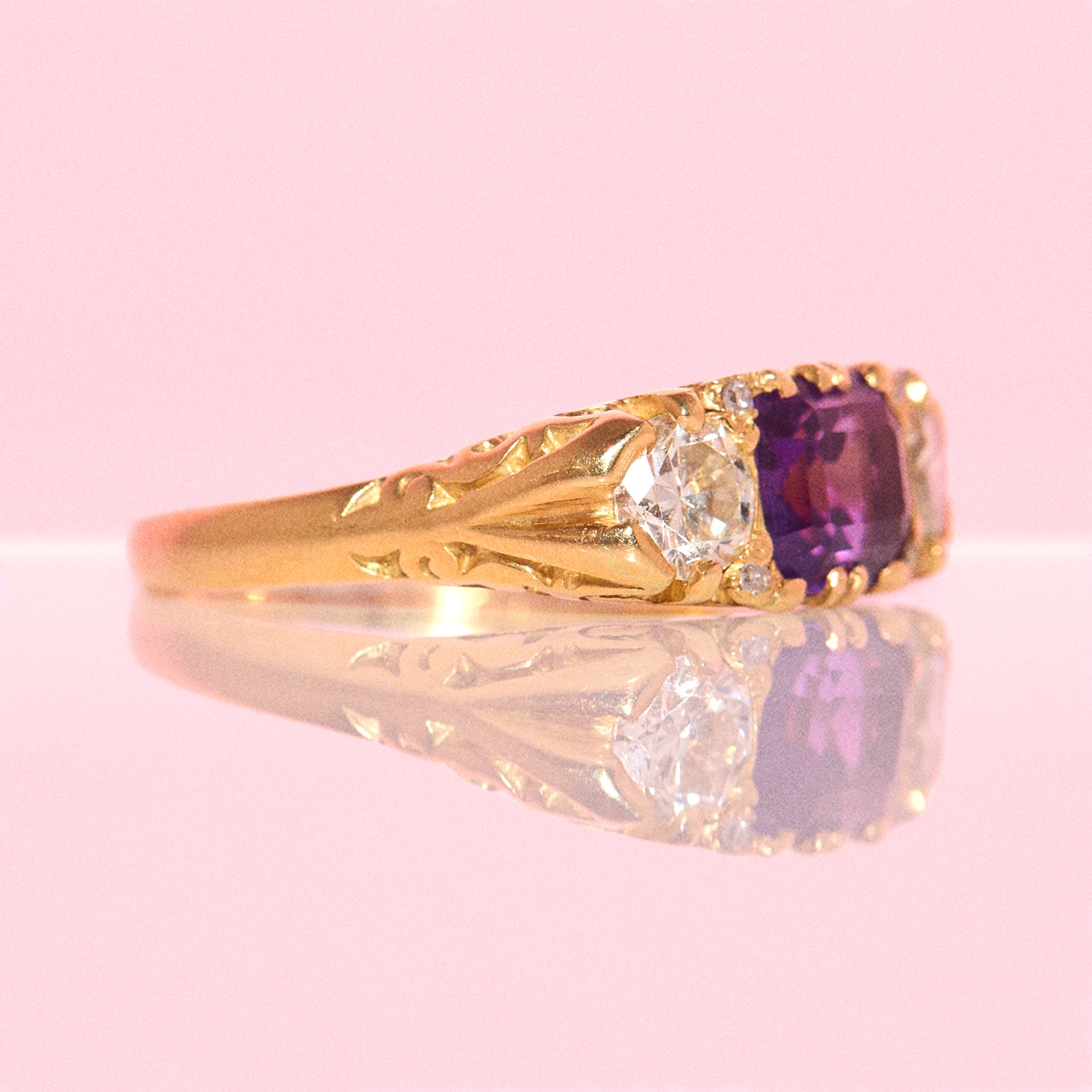 Vintage 18ct gold east to west amethyst and diamond carved ring