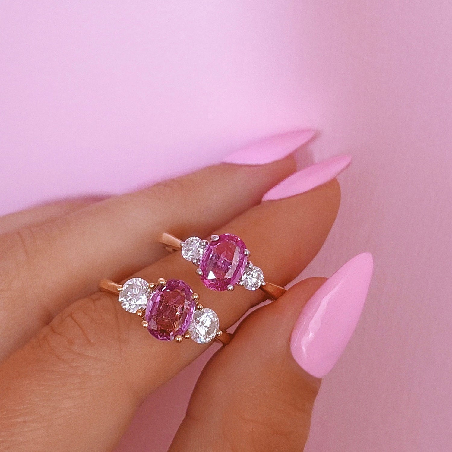 18ct gold 1.22ct pink sapphire and 0.25ct diamond three stone ring