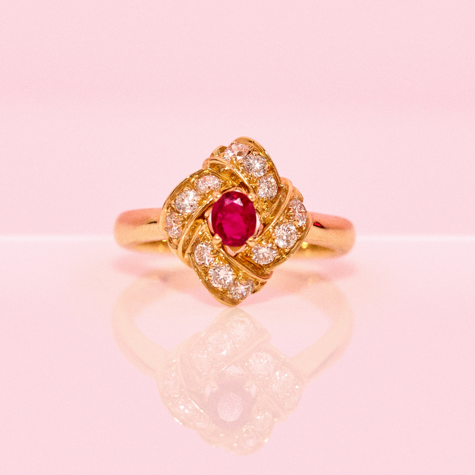 18ct gold ruby and diamond cluster ring