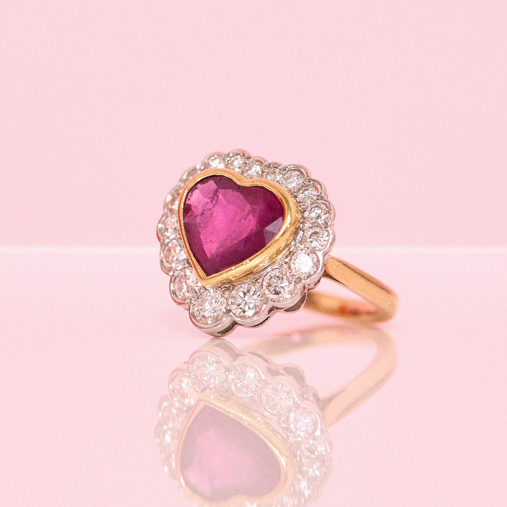 18ct gold 2.15ct bezel set heart-shaped Burma ruby and diamond cluster ring