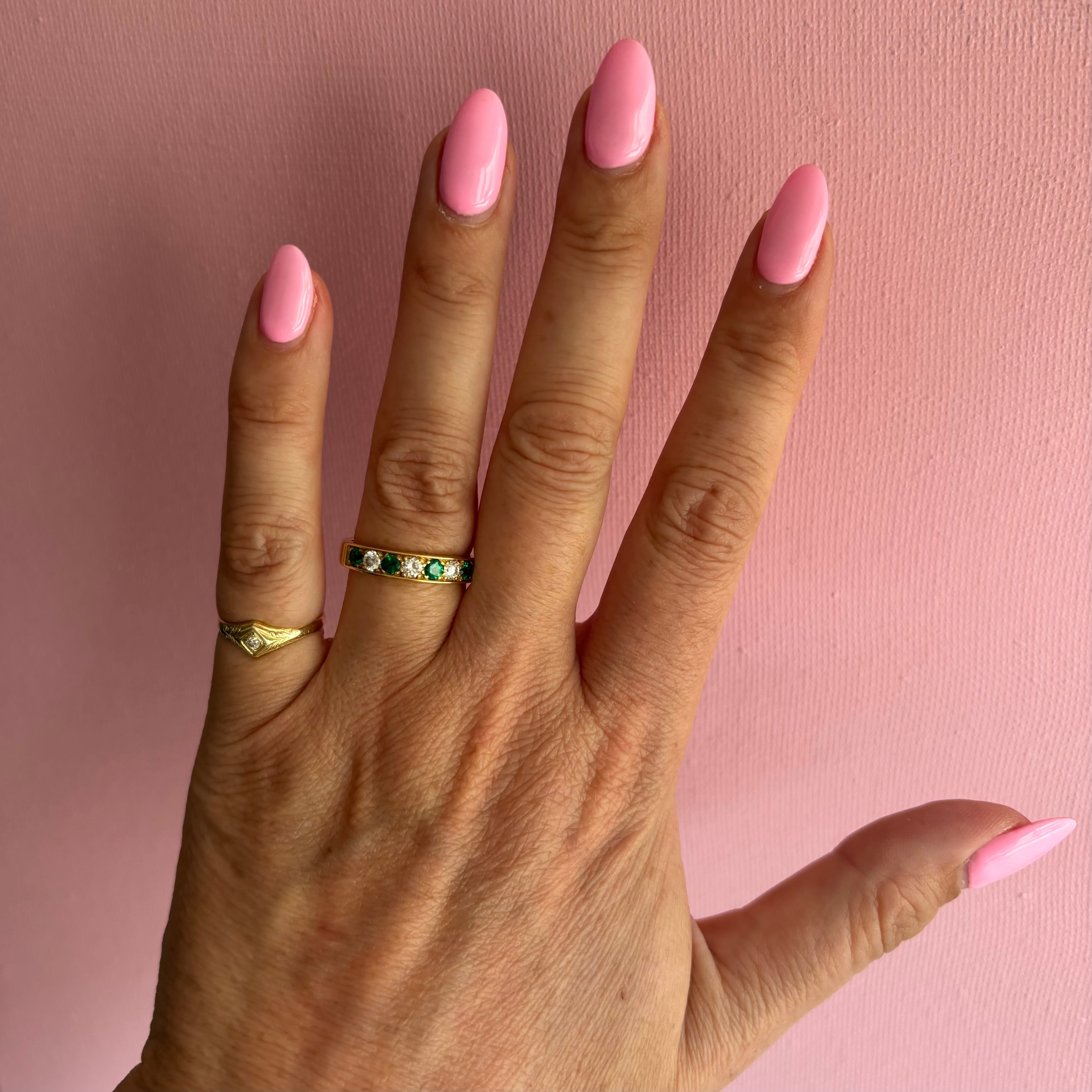18ct gold emerald and diamond half eternity ring