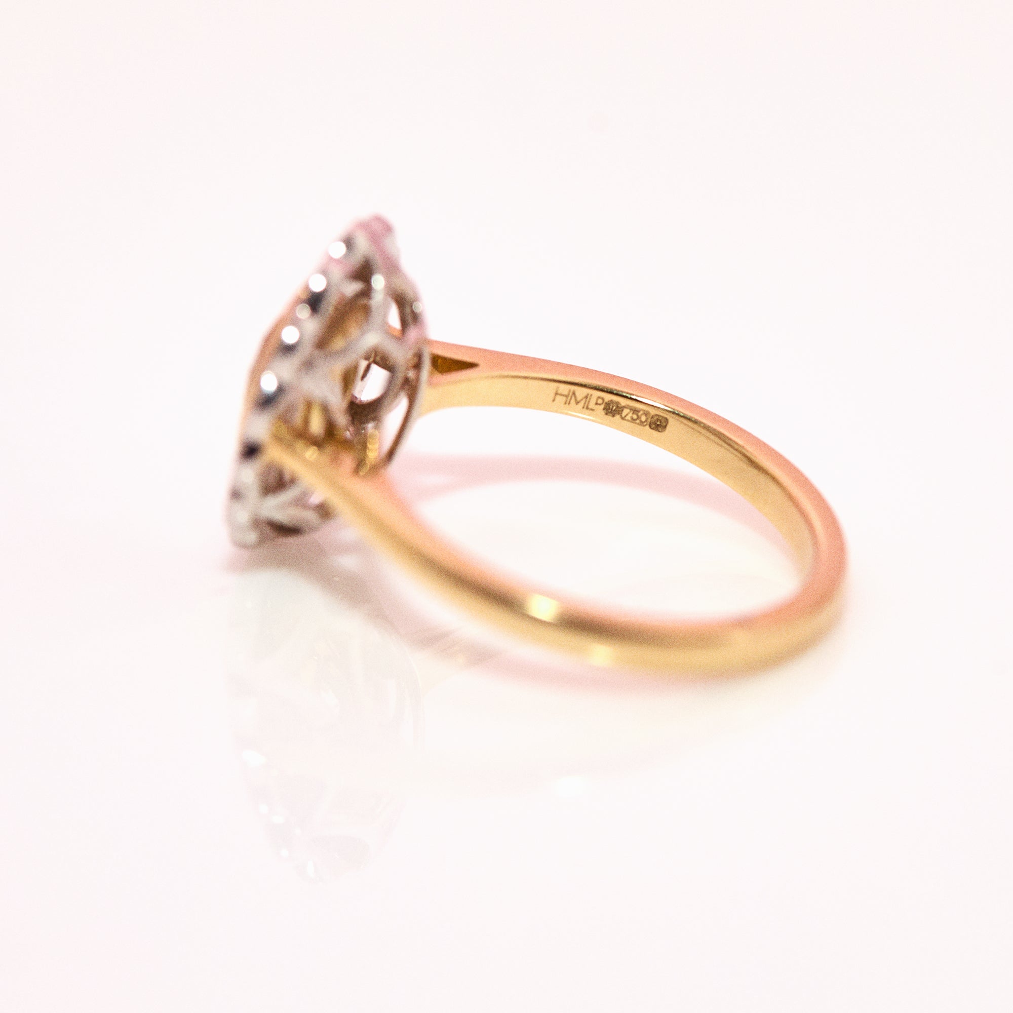 18ct gold 1.0ct oval, yellow diamond flower ring