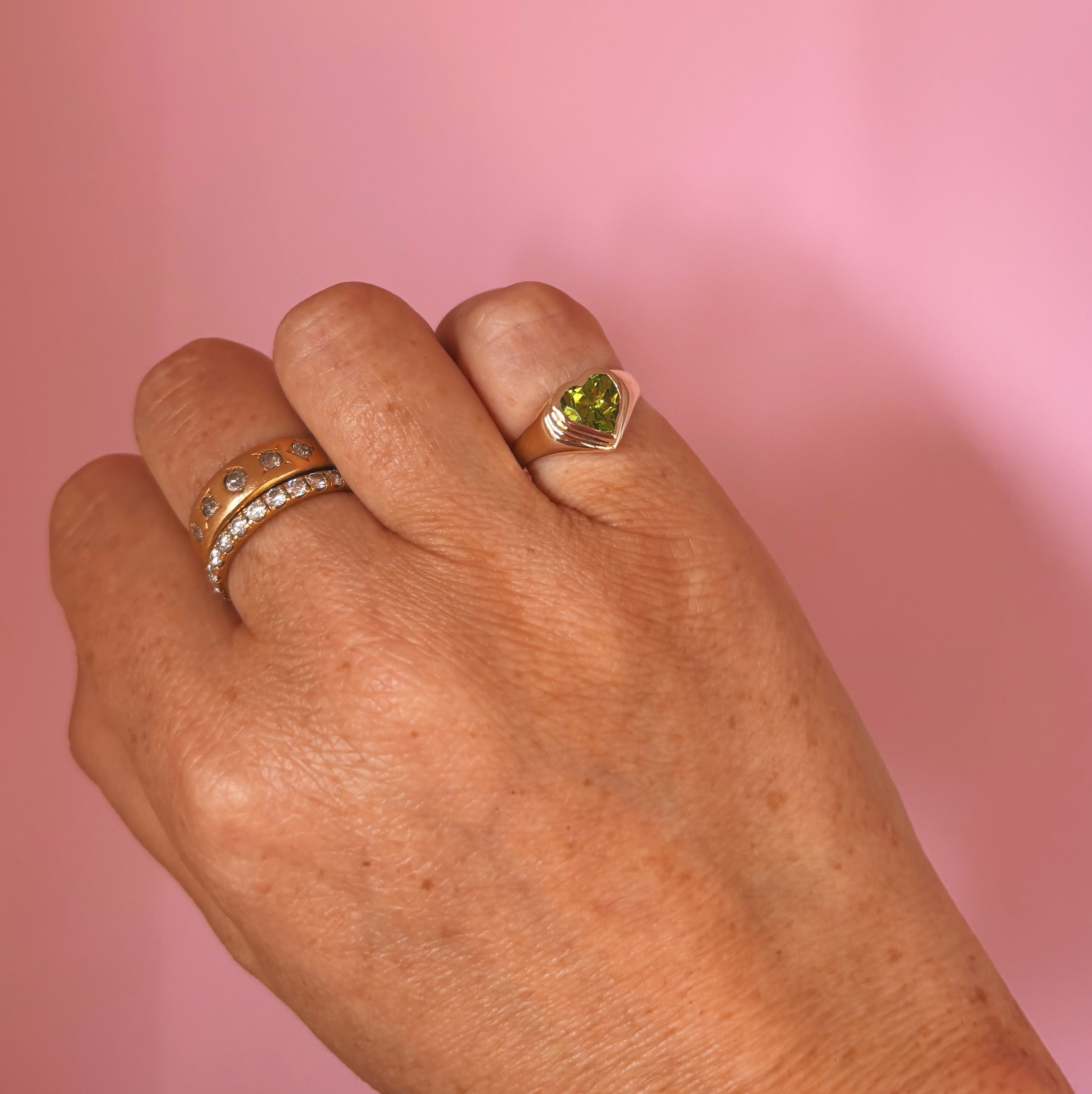 9ct gold bezel set heart shaped peridot signet ring