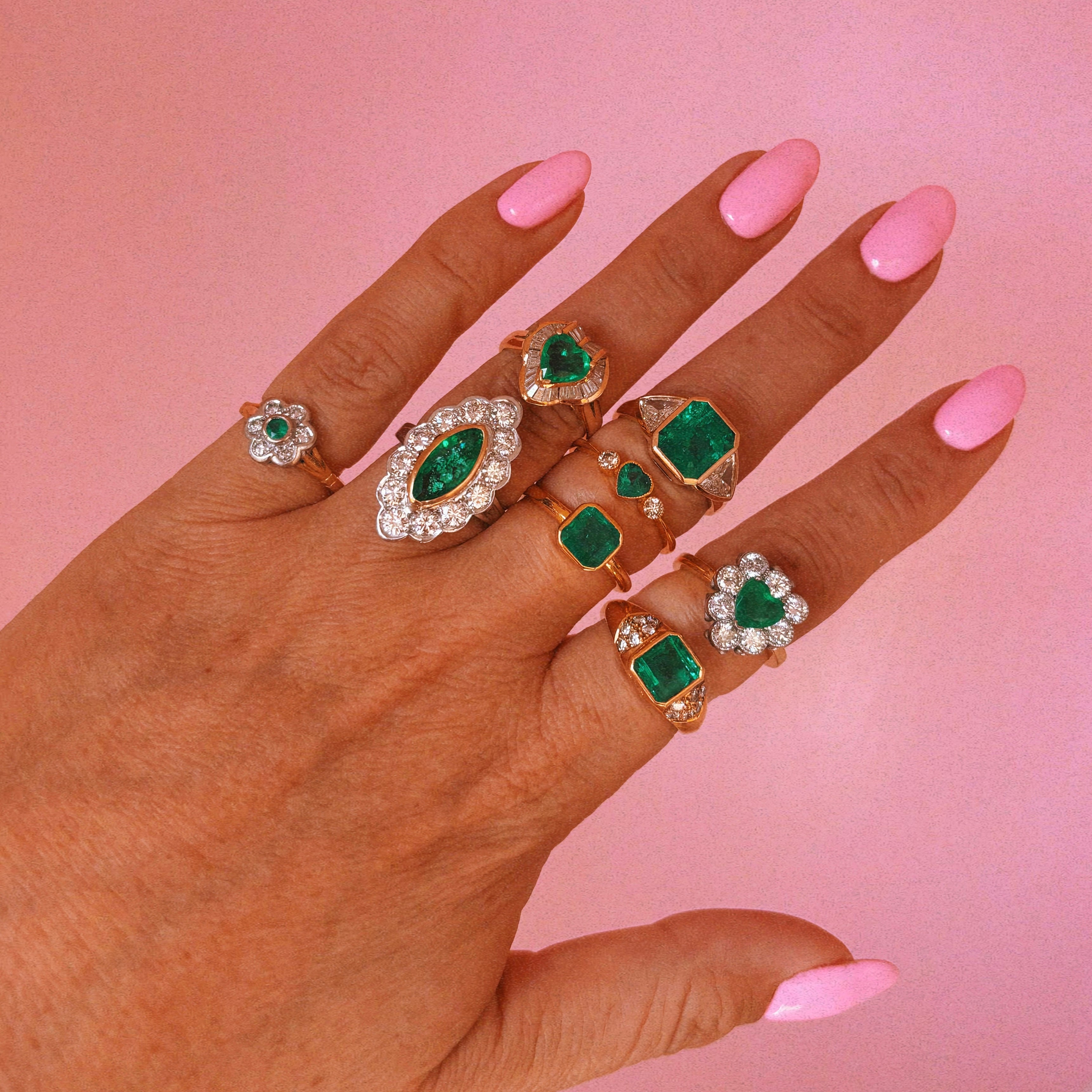 18ct white gold bezel set marquise emerald and diamond ring