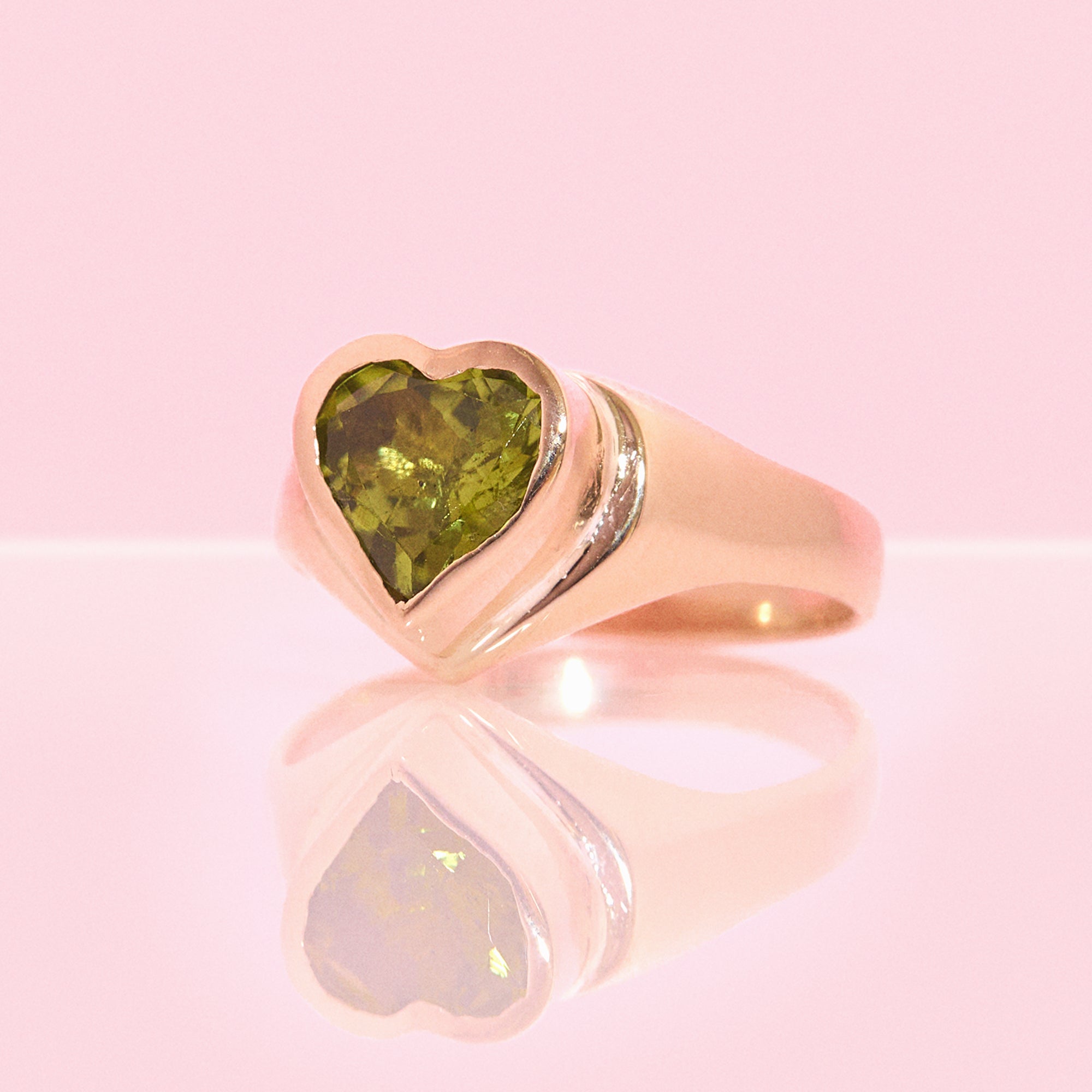 9ct gold bezel set heart shaped peridot signet ring