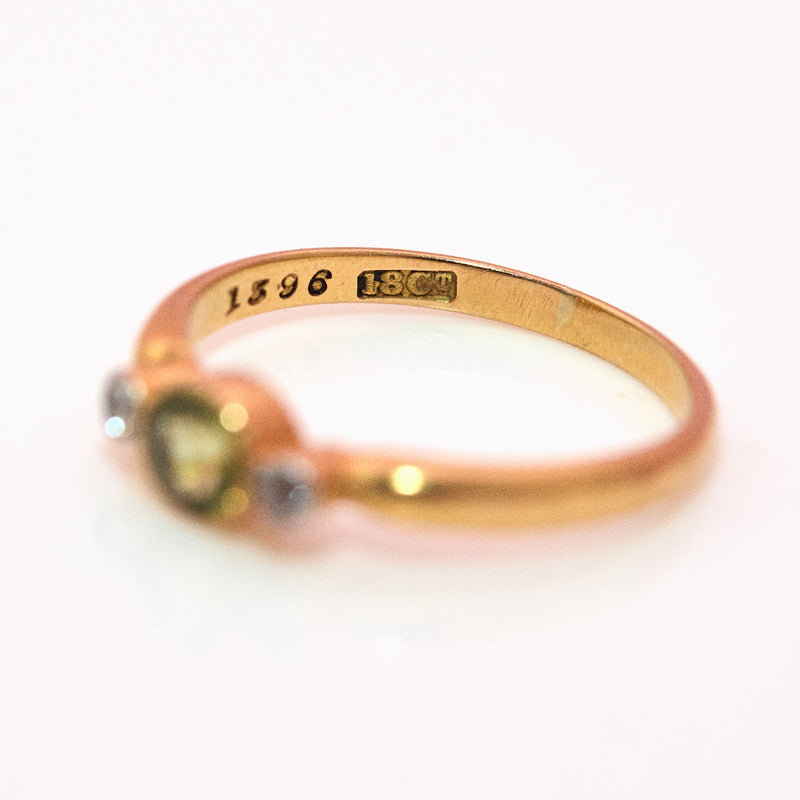 18ct gold peridot and diamond three stone ring