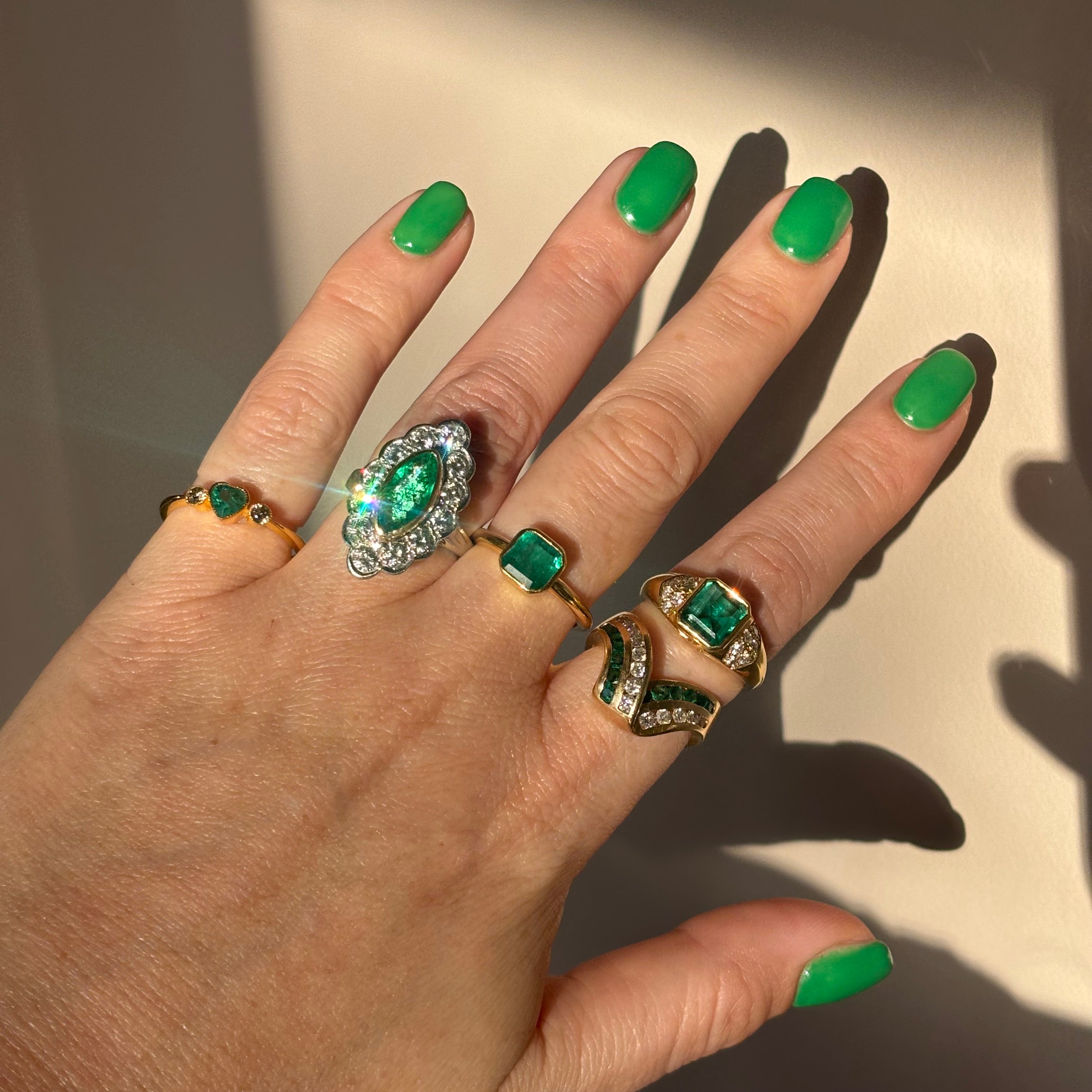 14ct gold emerald and diamond wishbone ring