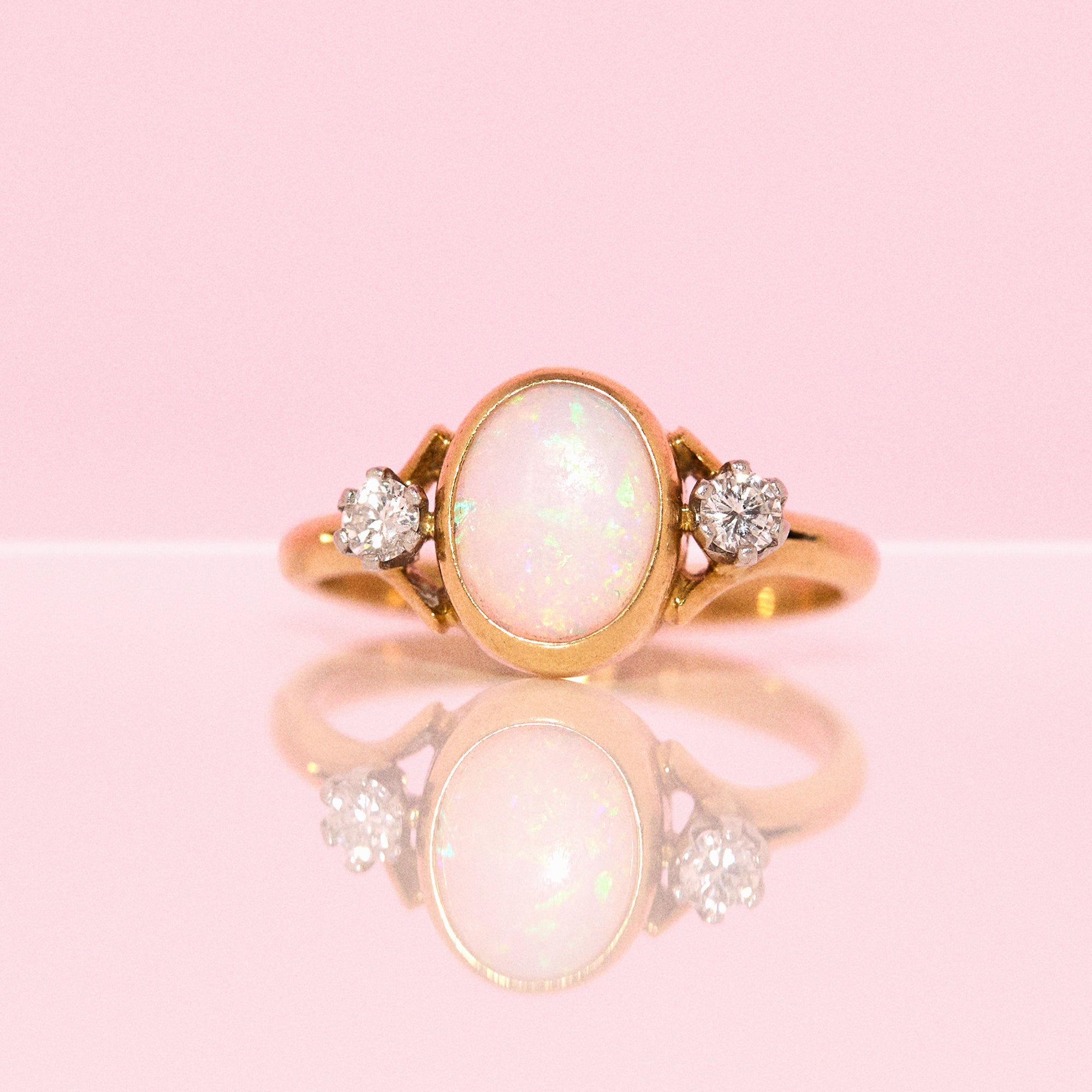 18ct gold opal and diamond three stone ring