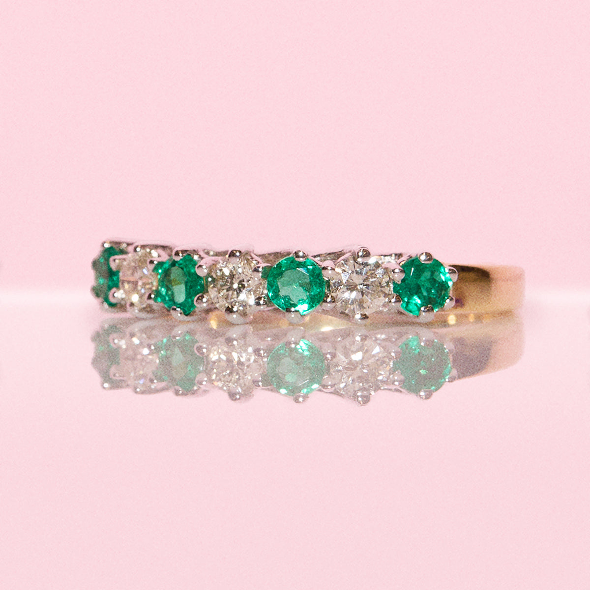 Vintage 18ct gold emerald and diamond half eternity ring