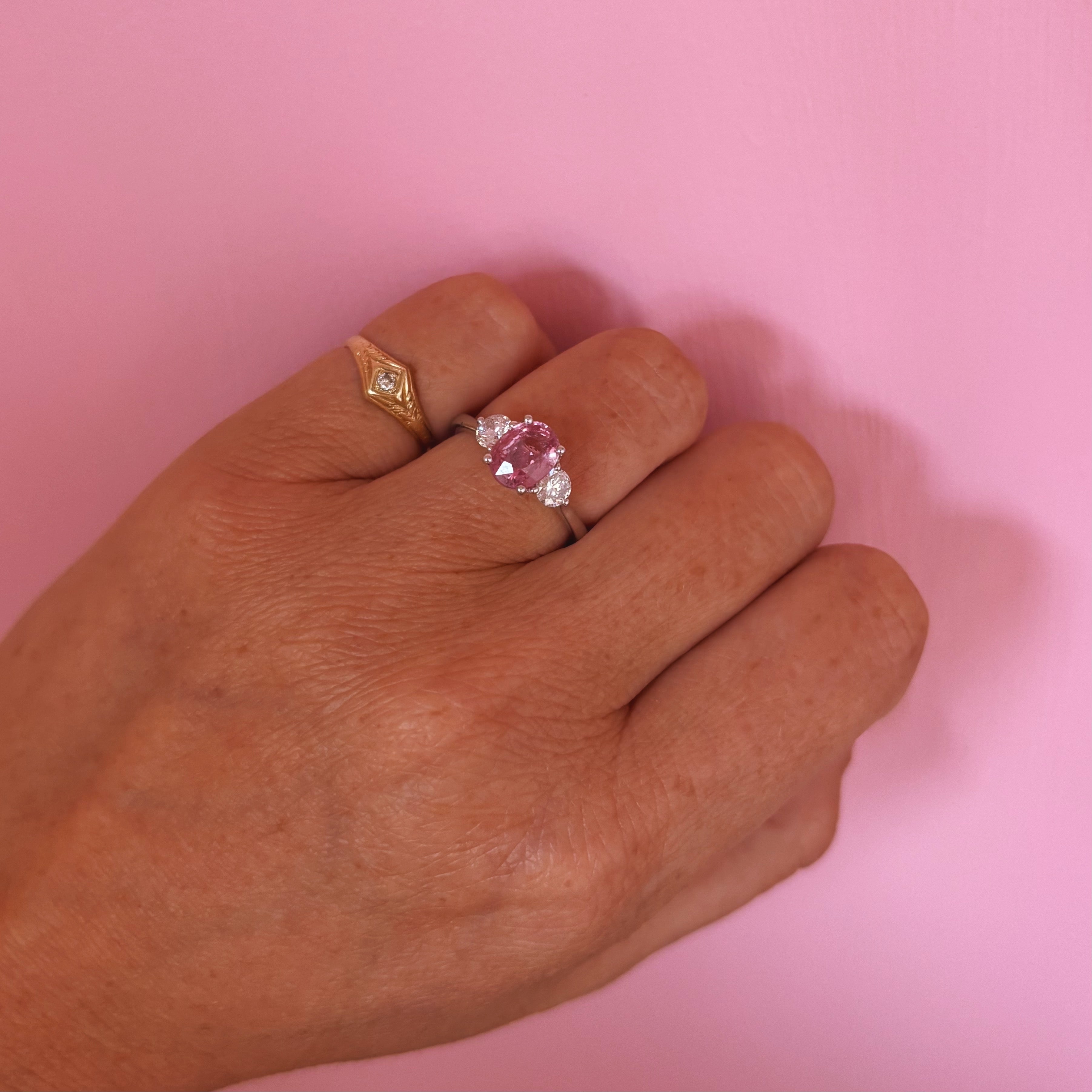 Platinum 1.24ct pink sapphire and 0.43ct diamond three stone ring (made to order)