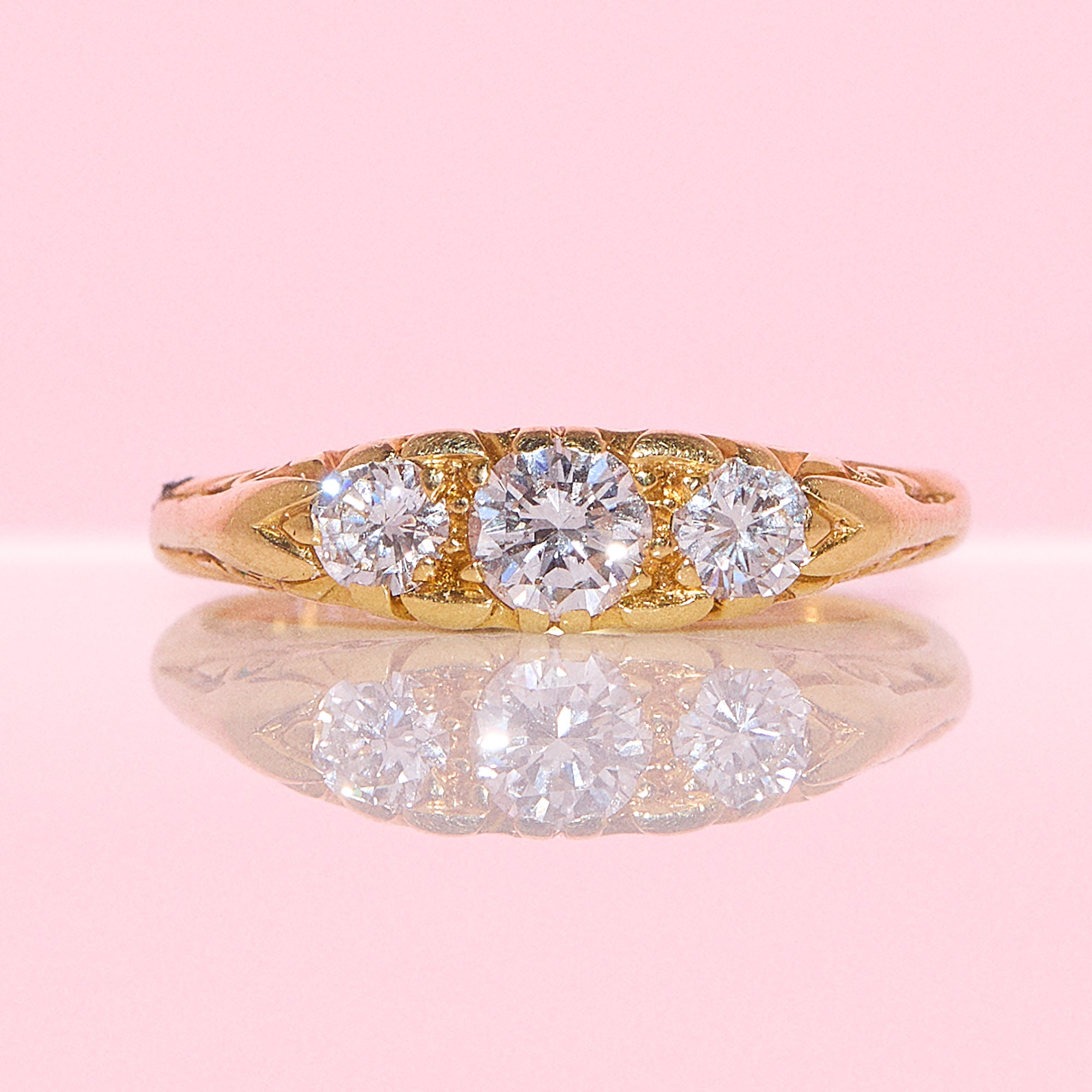 18ct gold diamond three stone carved ring from 1991