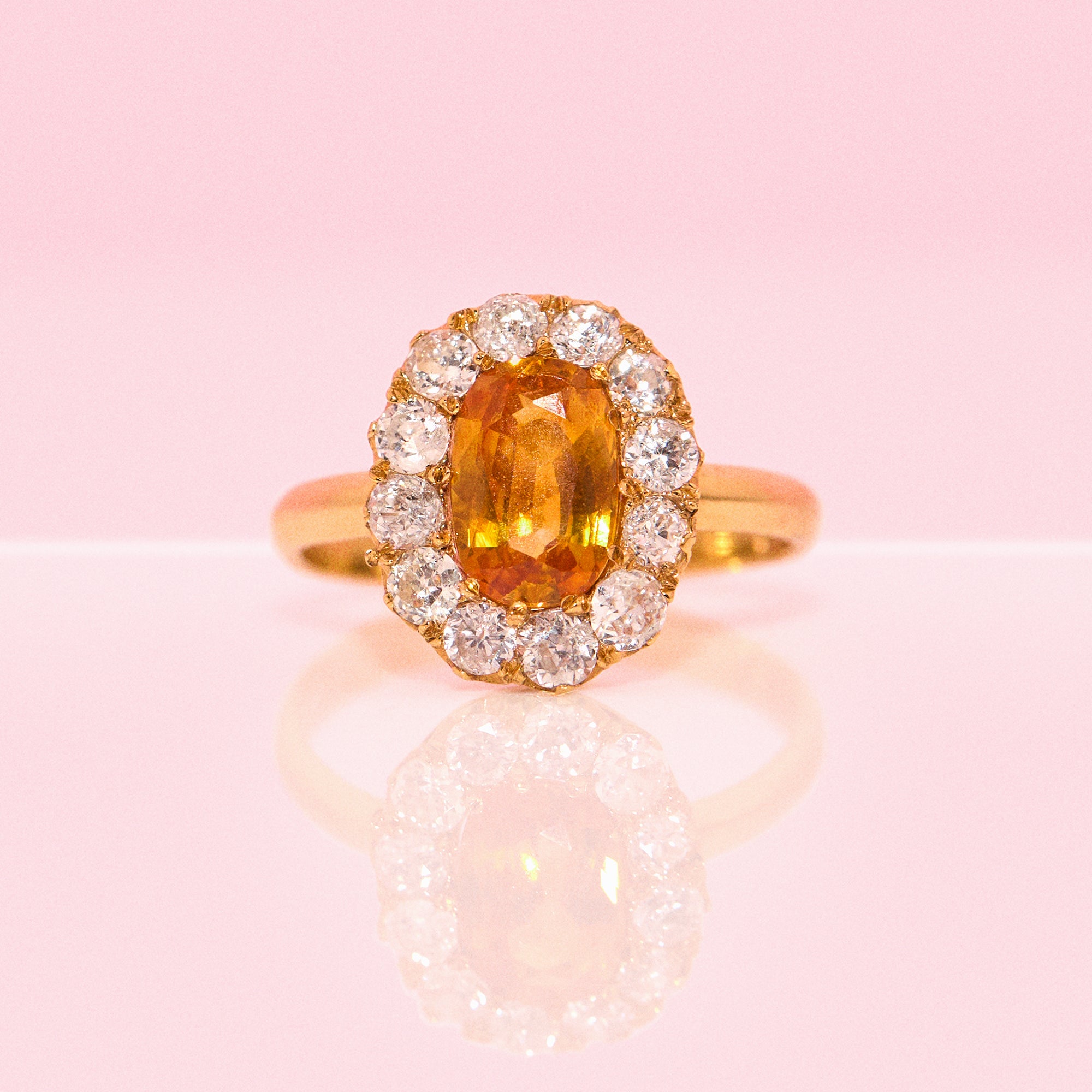 18ct gold orange sapphire and diamond cluster ring