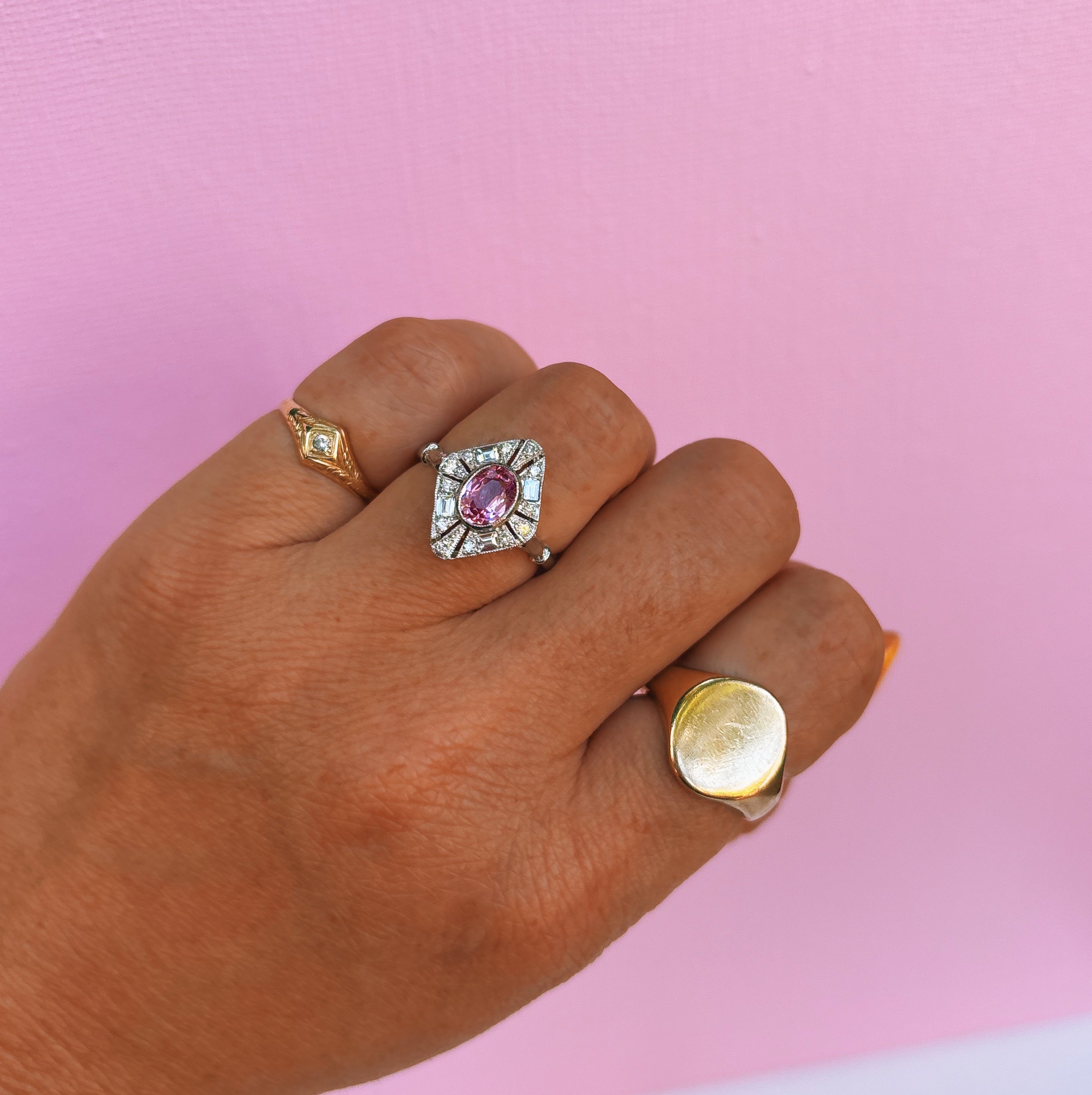 Platinum pink sapphire and diamond cluster ring