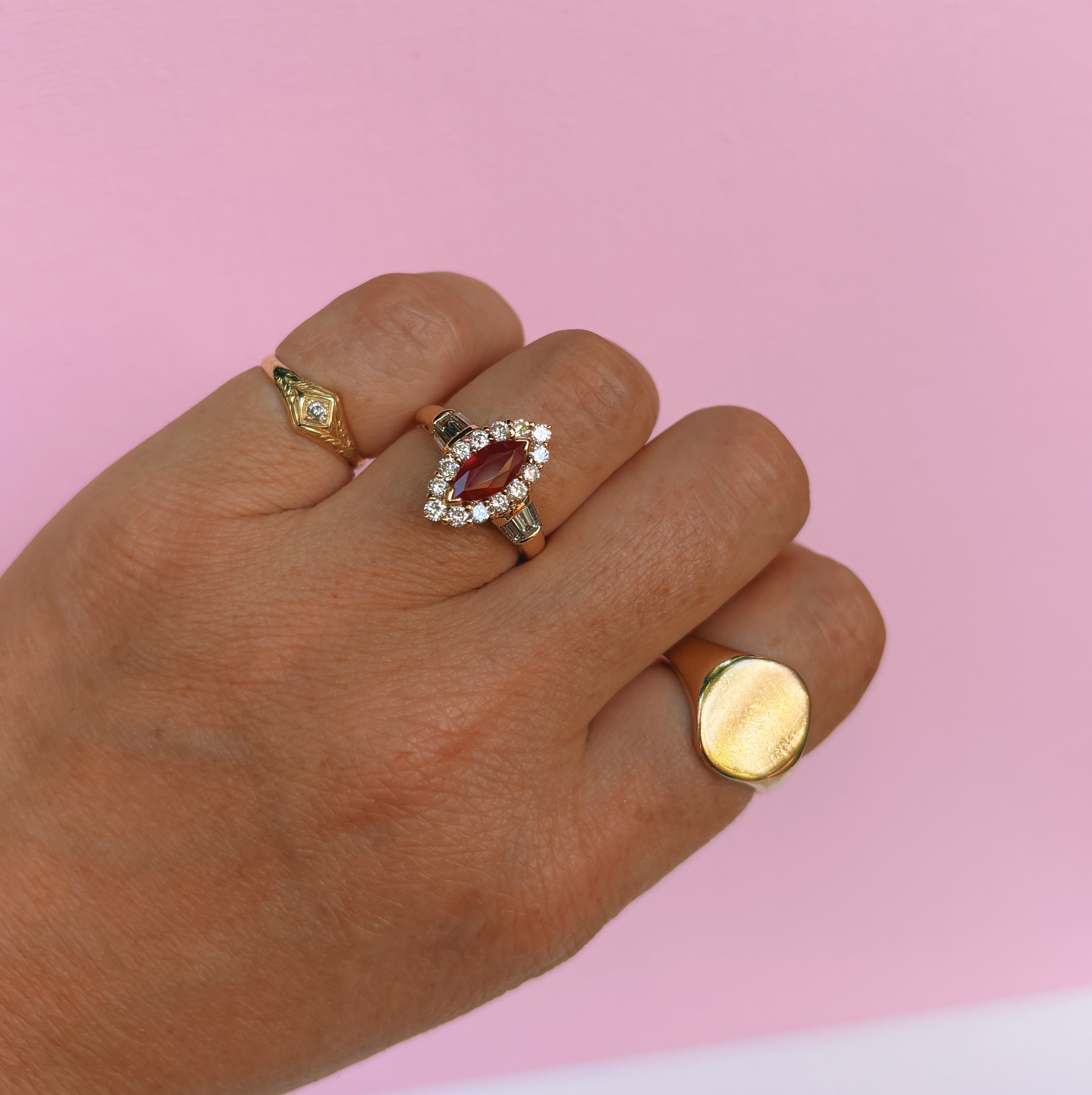 18ct gold 1.08ct marquise cut ruby and diamond cluster ring