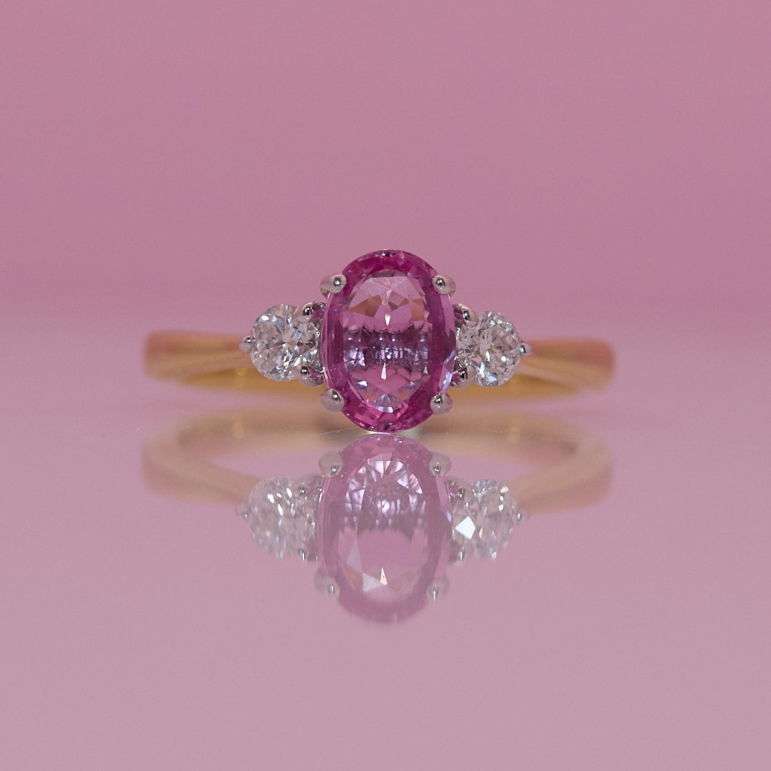 18ct gold 1.22ct pink sapphire and 0.25ct diamond three stone ring