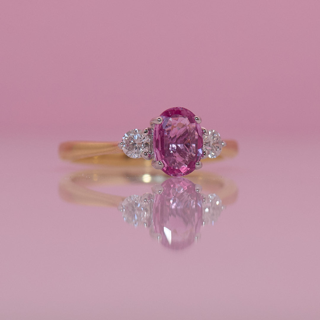 18ct gold 1.22ct pink sapphire and 0.25ct diamond three stone ring
