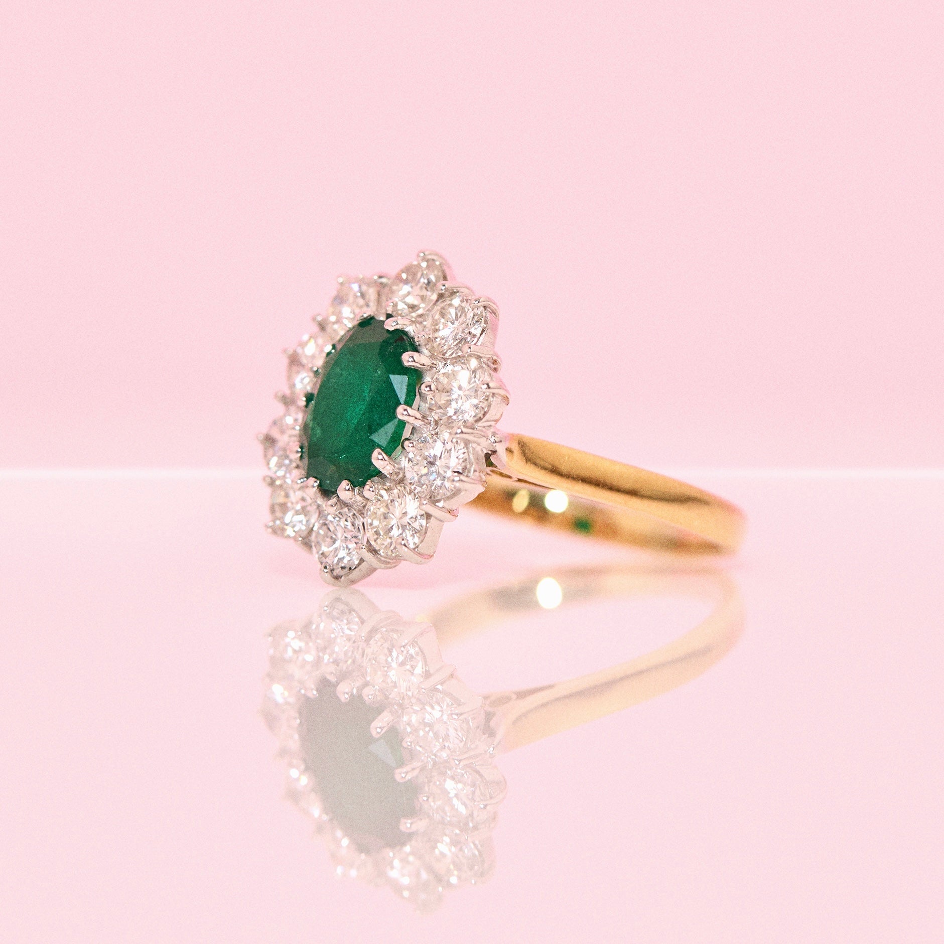 18ct gold emerald and diamond cluster ring