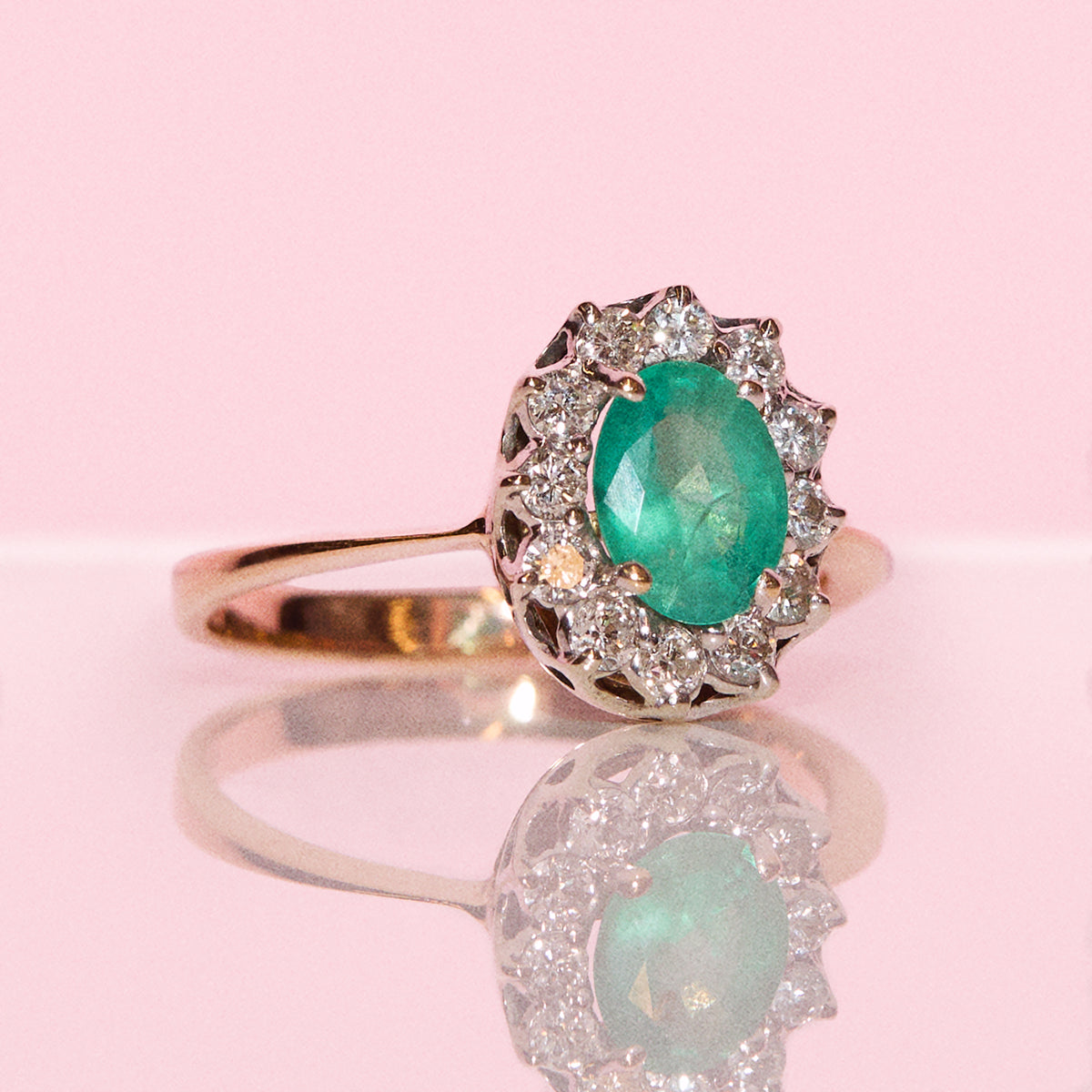 Vintage 14ct gold 1ct emerald and 0.24ct diamond cluster ring
