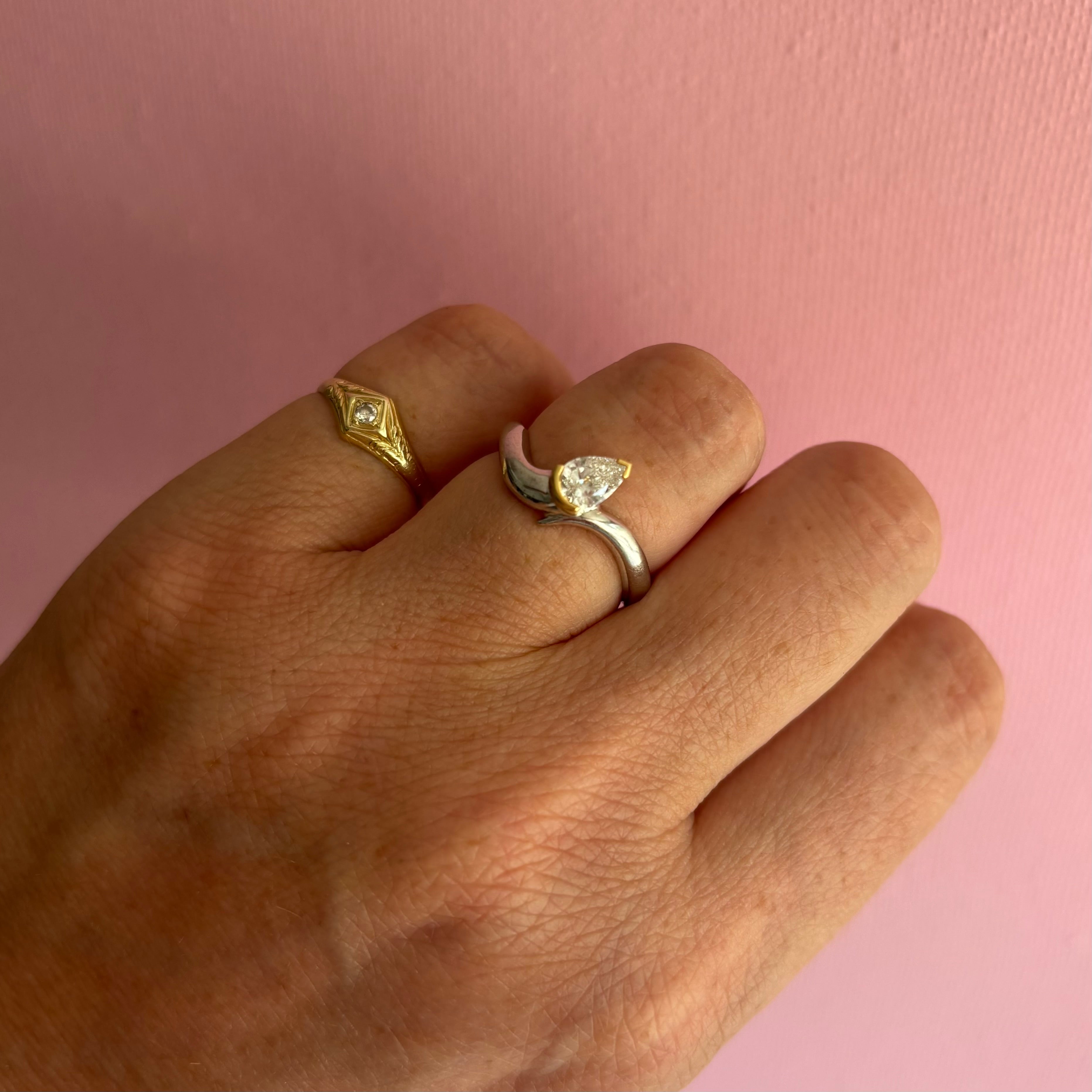 18ct white gold pear shaped diamond ring