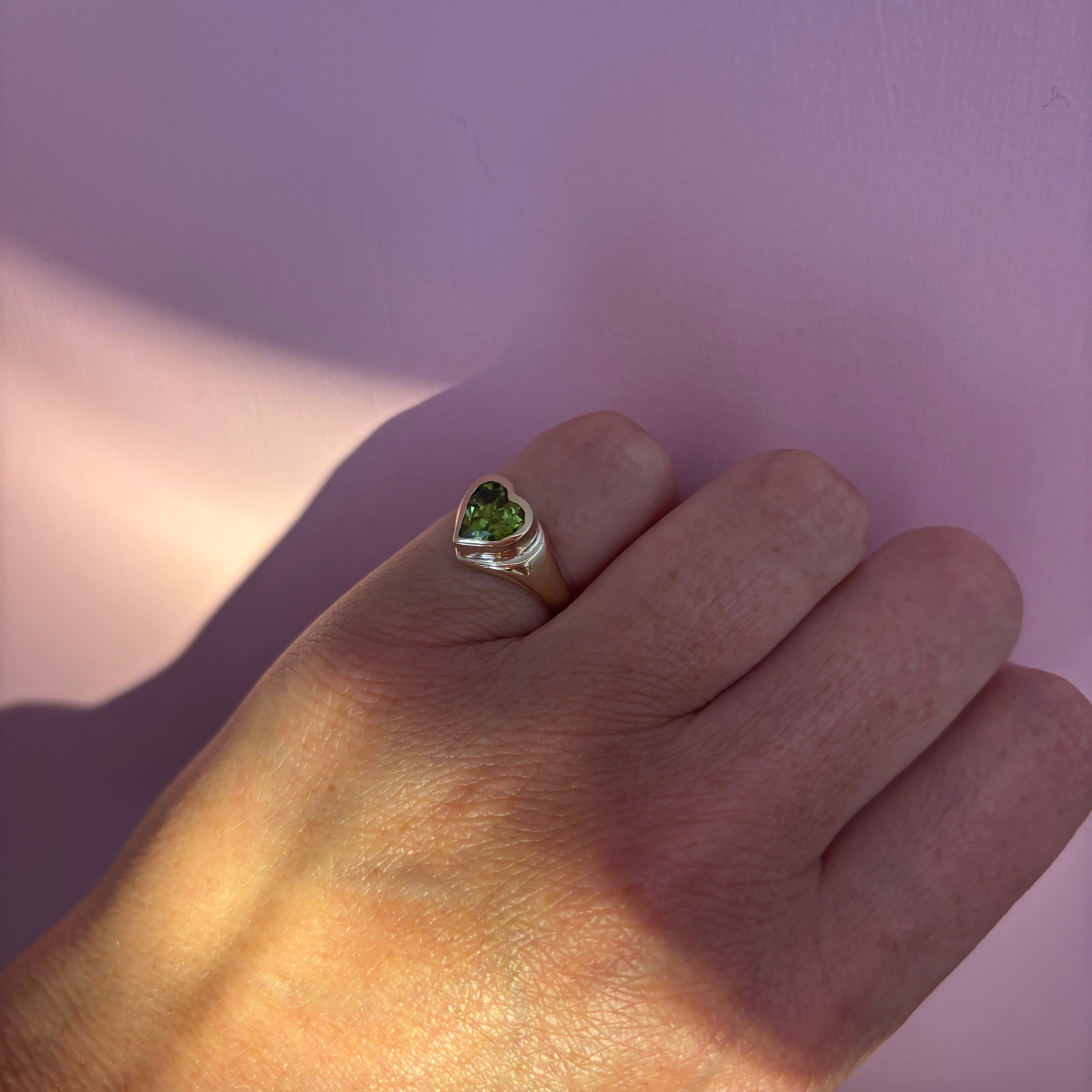 9ct gold bezel set heart shaped peridot signet ring