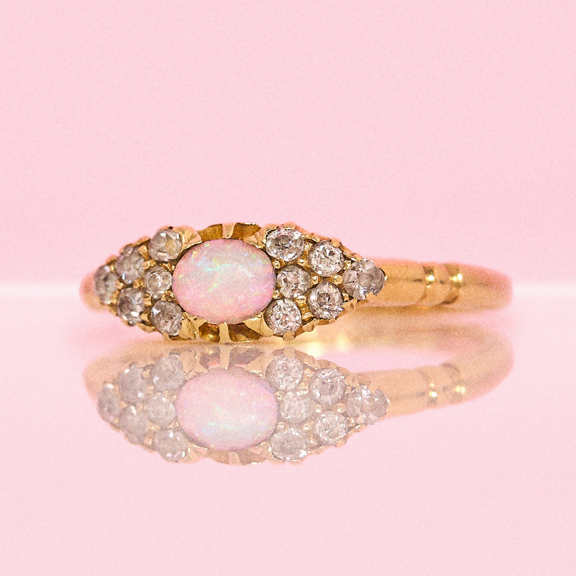 18ct gold opal and old cut diamond east to west Victorian ring