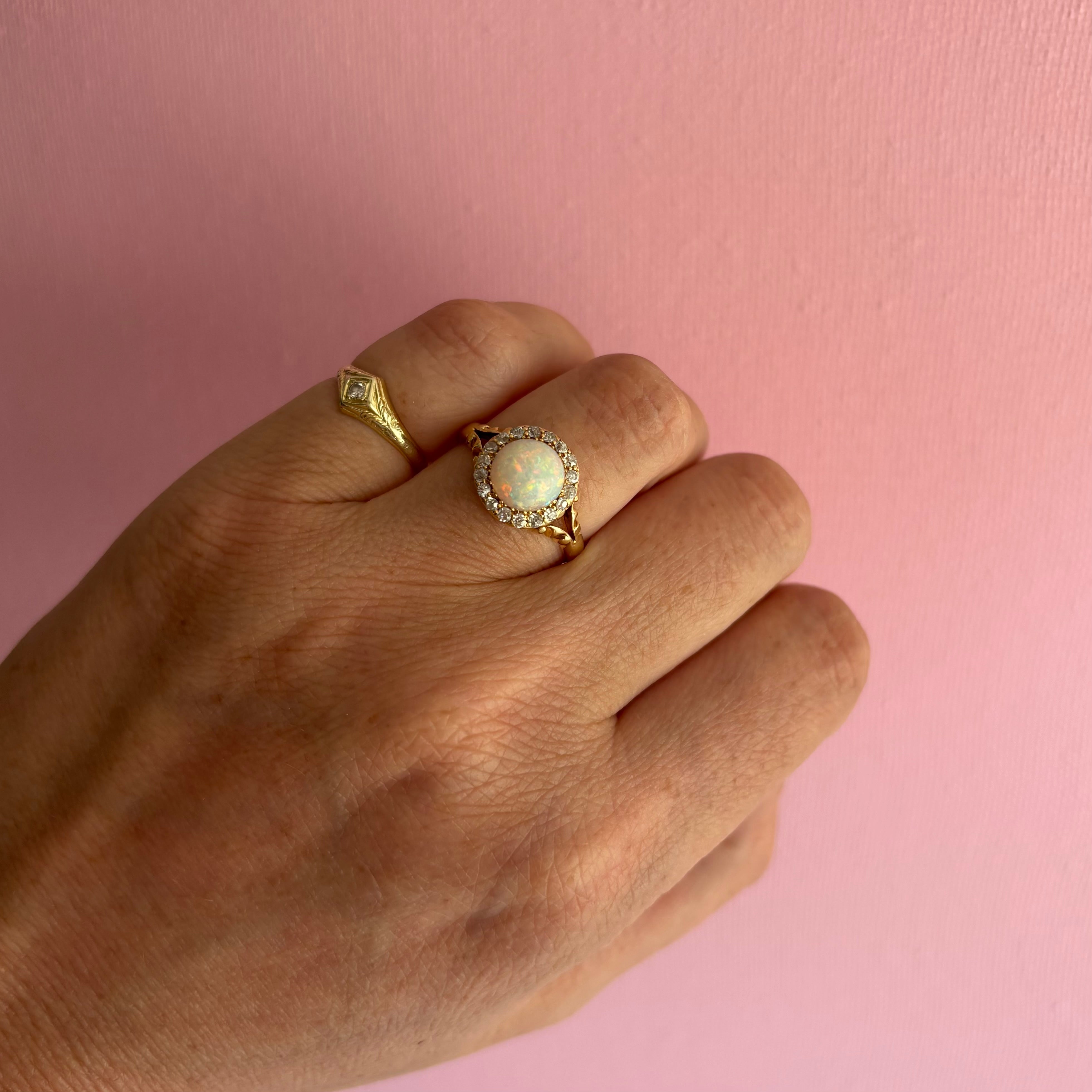 18ct gold round opal and diamond cluster ring