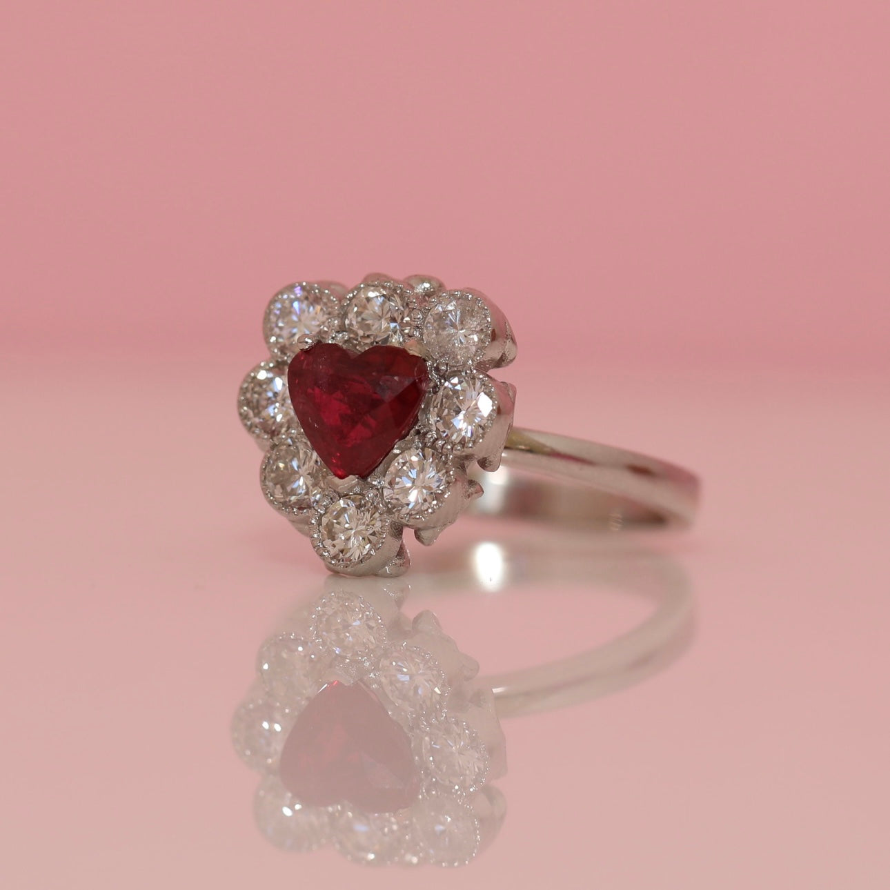 Platinum heart-shaped ruby and diamond vintage earring conversion ring