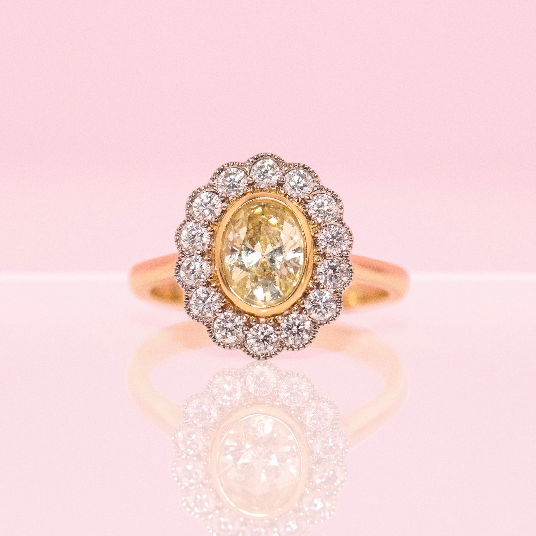 18ct gold 1.0ct oval, yellow diamond flower ring