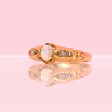 18ct gold opal and diamond eye ring