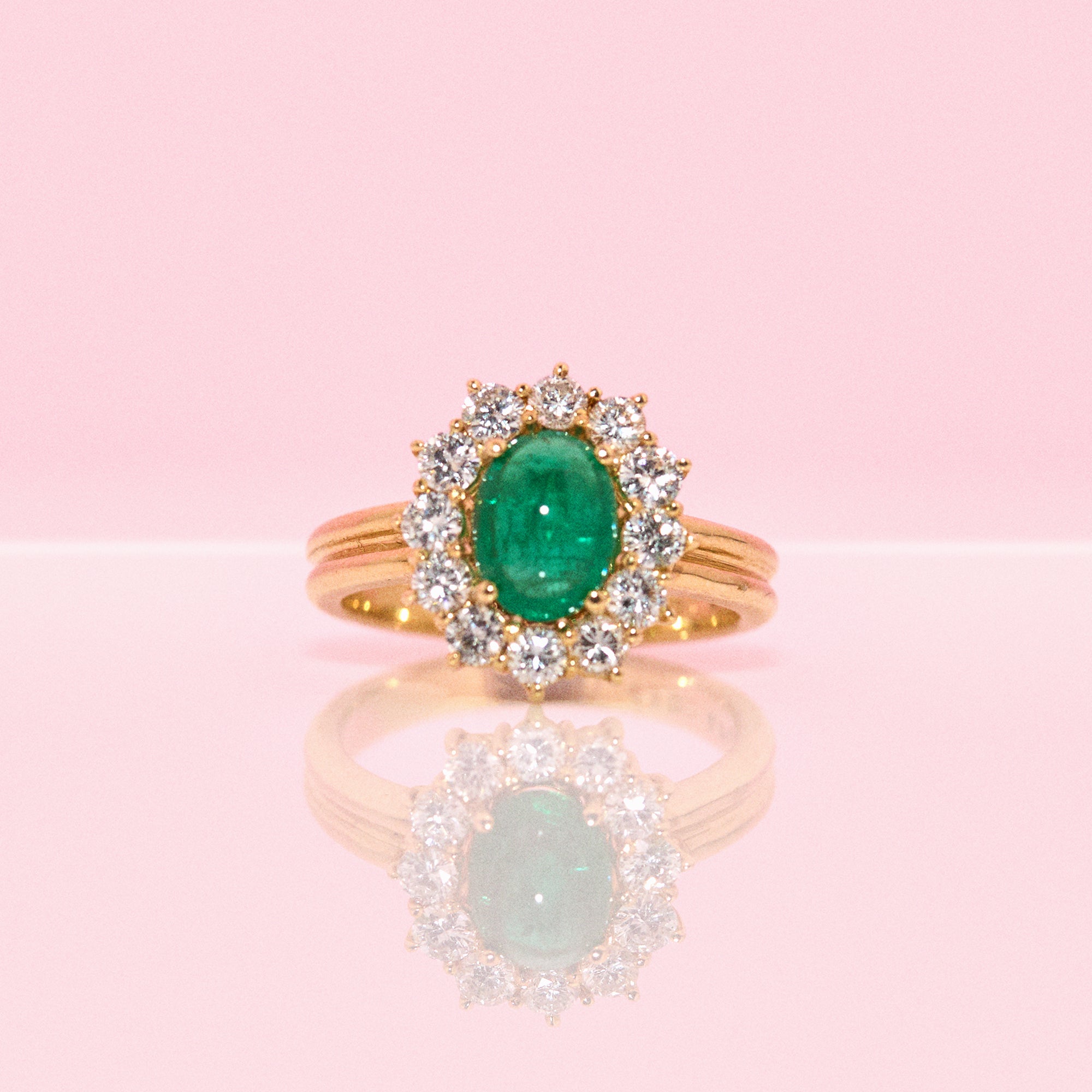 18ct gold emerald cabochon and diamond cluster ring