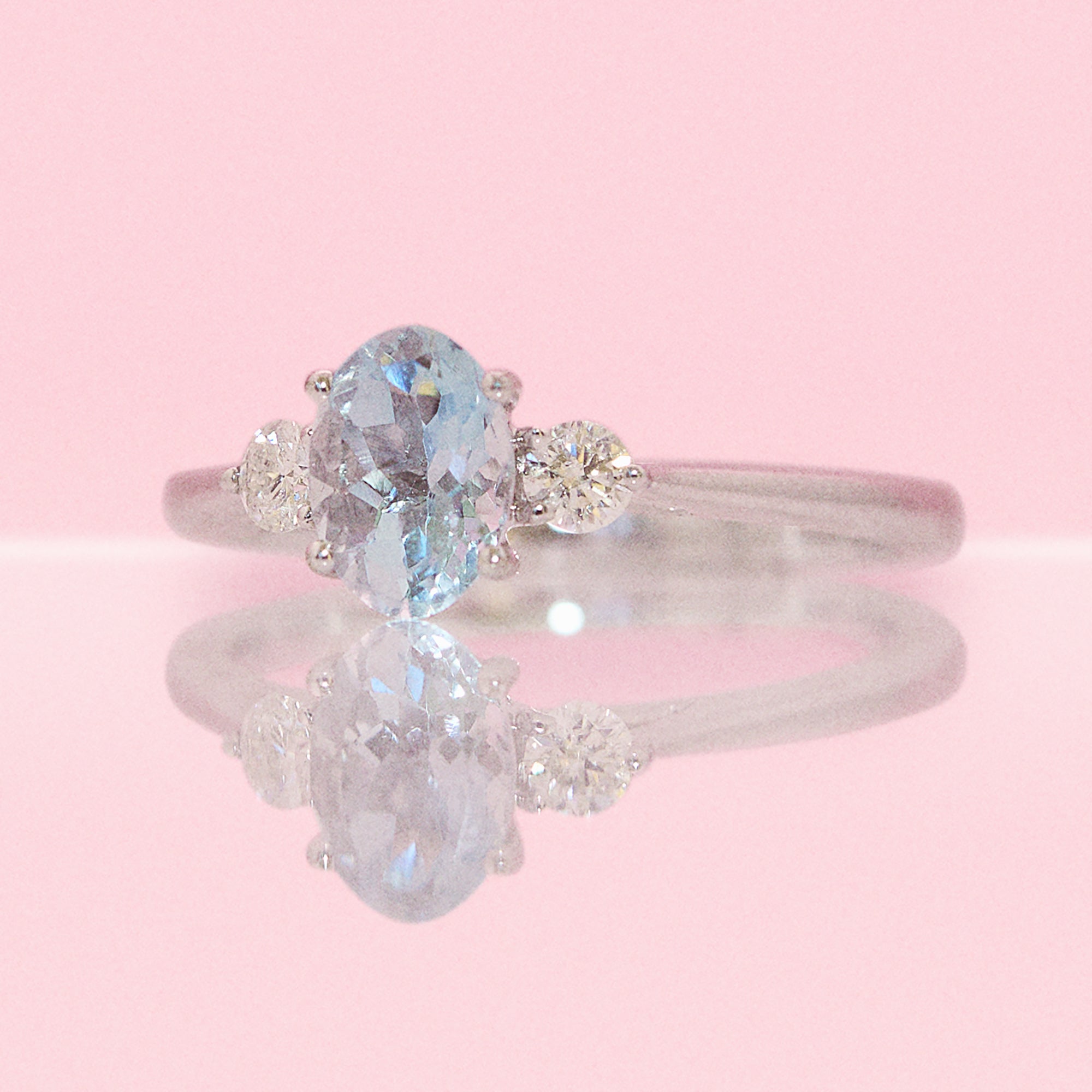 9ct white gold 1.03ct aquamarine and 0.16ct diamond three stone ring