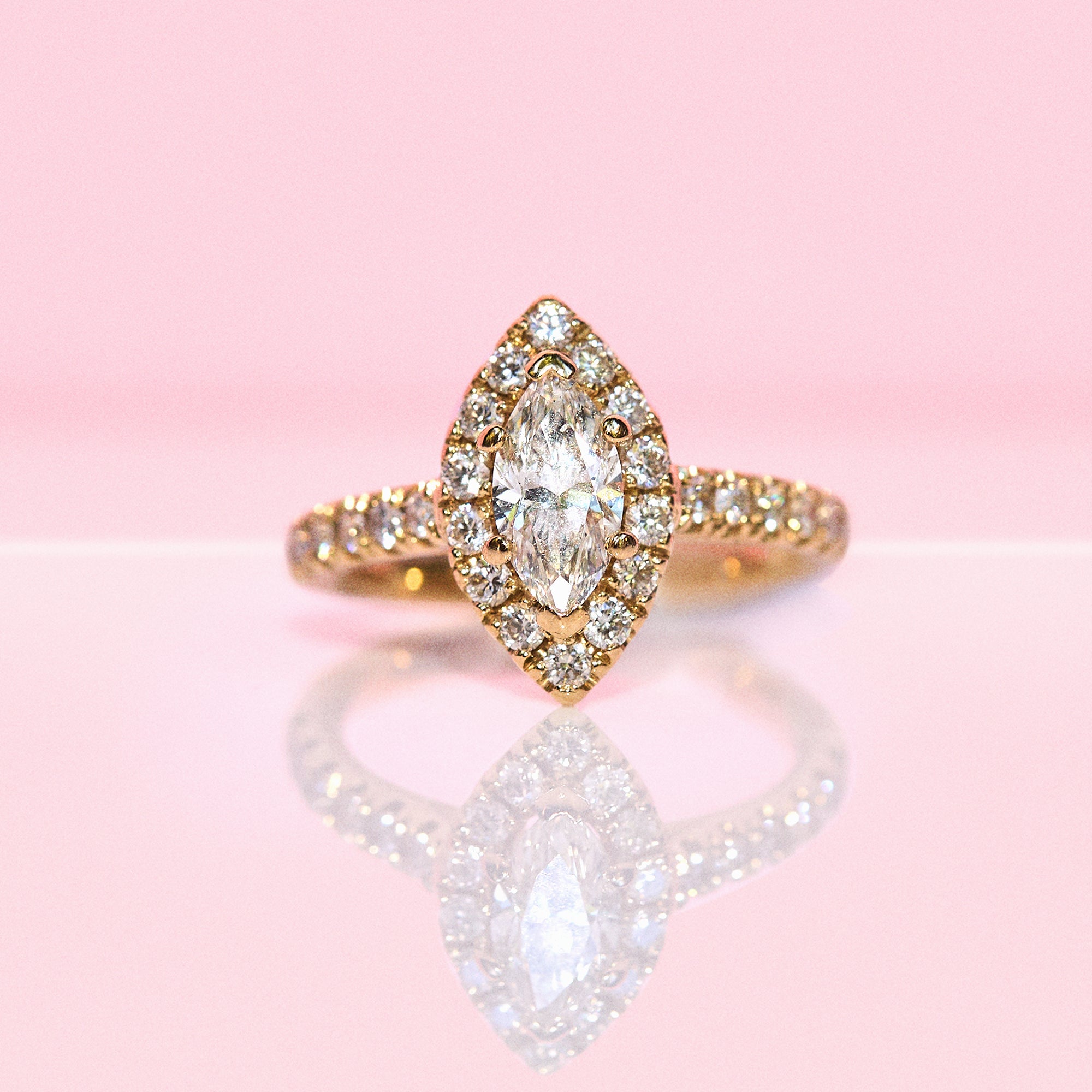 18ct gold 0.85ct marquise cut diamond halo ring