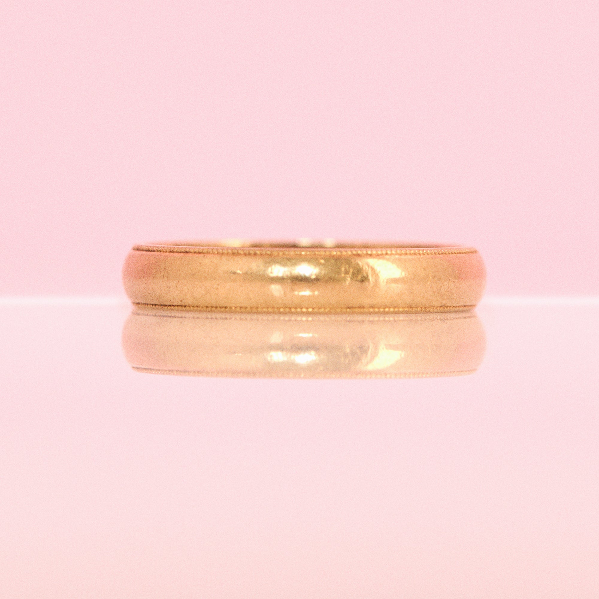 18ct gold band with a beaded edge from 1986