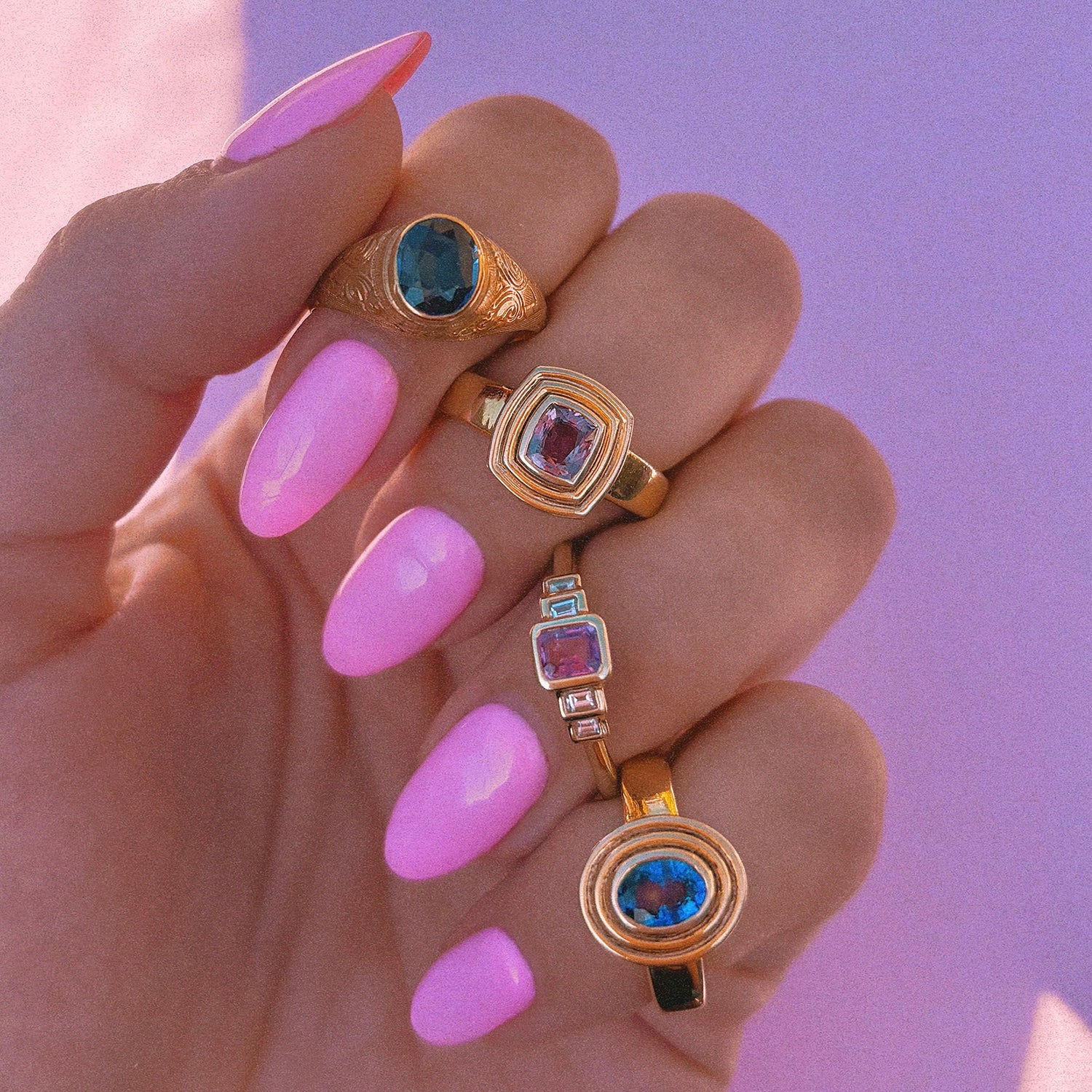 14ct gold plum mauve sapphire bezel set ring