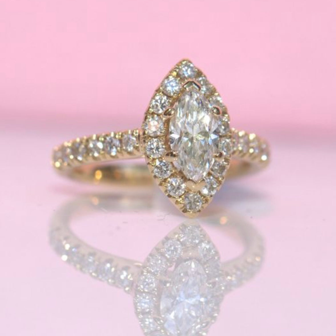 18ct gold 0.85ct marquise cut diamond halo ring