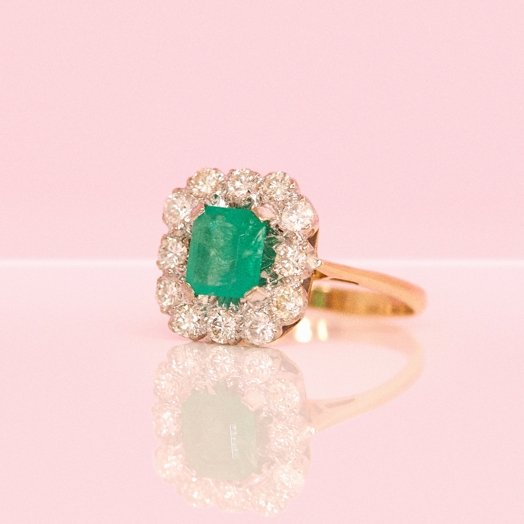 18ct gold emerald and diamond cluster ring