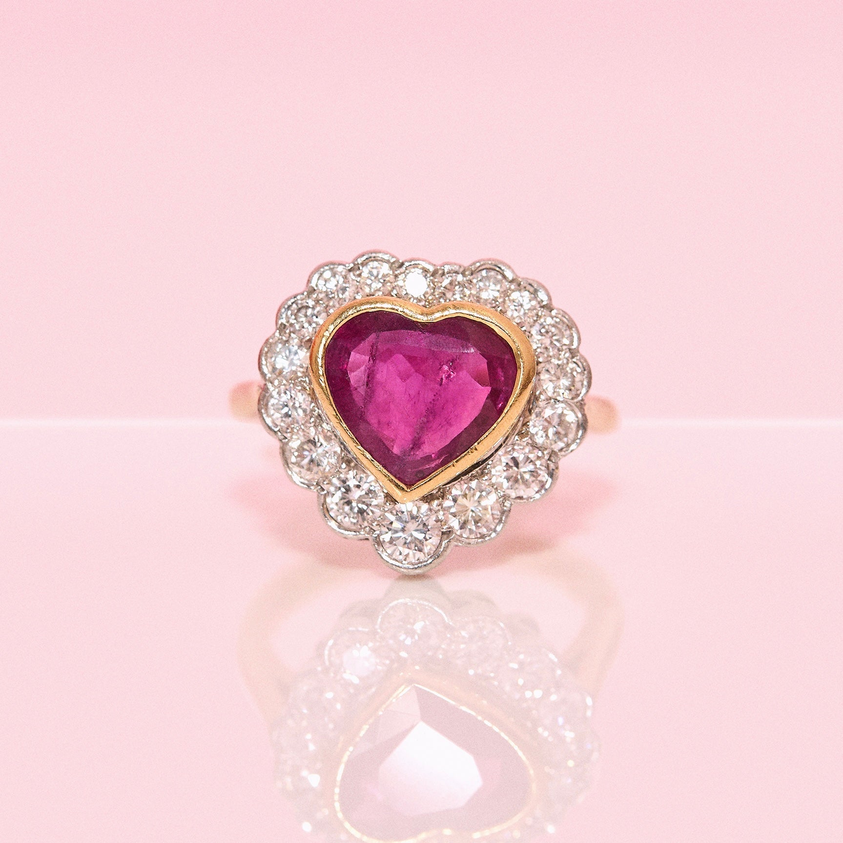 18ct gold 2.15ct bezel set heart-shaped Burma ruby and diamond cluster ring