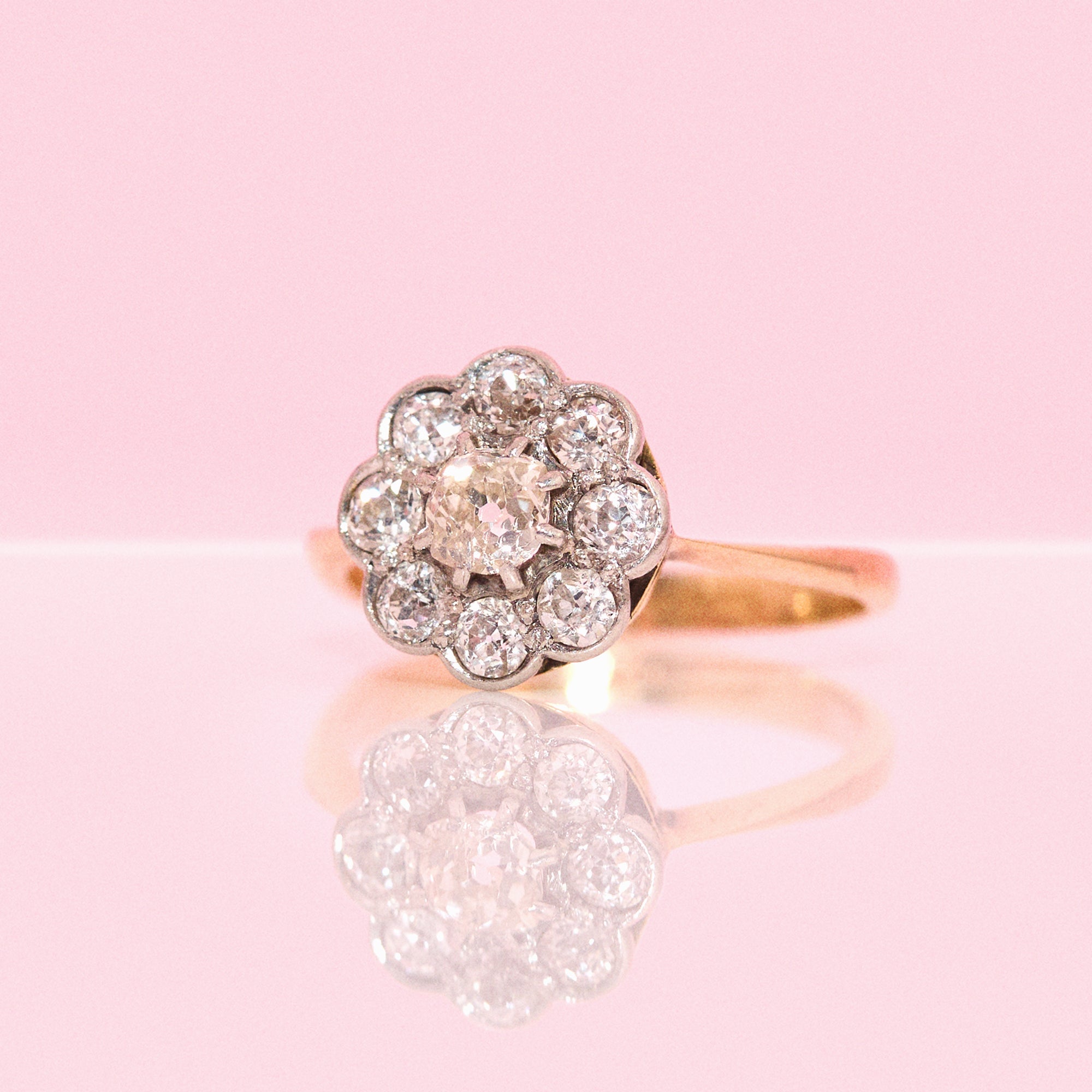 18ct gold old cut diamond flower ring from 1931