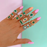 18ct gold emerald and diamond cluster ring