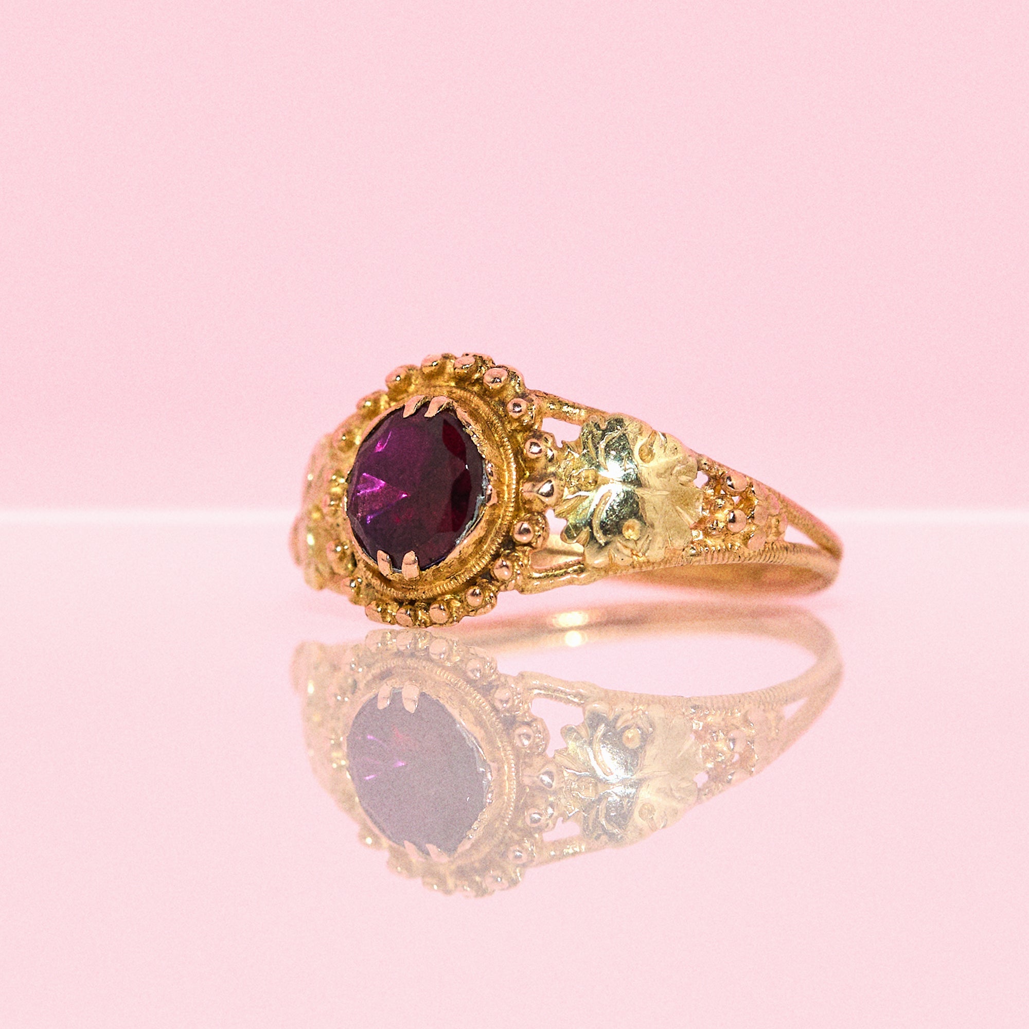 18ct gold almandine garnet ring