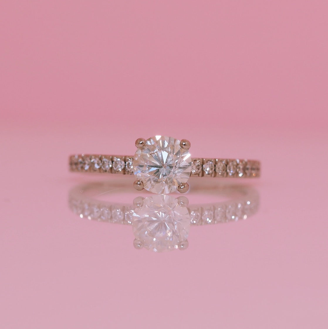 Platinum 1.0ct diamond ring with diamond shoulders